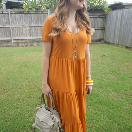 Orange and grey again with my little Rebecca Minkoff mini MAB that just goes with everything! I like the neutral grey with this Kmart amber tiered midi dress🧡

#LTKaustralia
