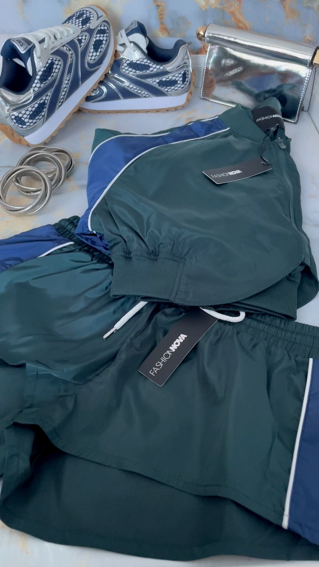 DISCLAIMER: Please search for the items on Fashion Nova website directly. 
Size Reference I got a small Jacket and medium shorts 
🔍 Your Best Shot Double Zip Windbreaker Jacket - Green/combo
🔍 Your Best Shot Windbreaker Track Micro Short - Green/combo

#LTKgrwm #LTKootd #LTKdayinmylife