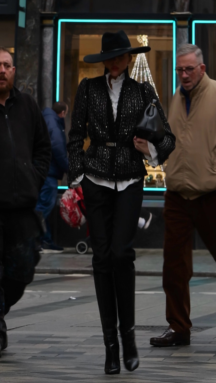 A timeless all black look built around tailored black trousers paired with a structured tweed jacket for sharp, classic polish. I’ve layered a soft ruffle blouse underneath to add movement and femininity, finished with a black fedora hat and sleek black stiletto knee high boots for a refined, powerful silhouette. Effortless, elegant and perfect for city days that turn into evening plans.

#LTKuk #LTKwinter #LTKeurope