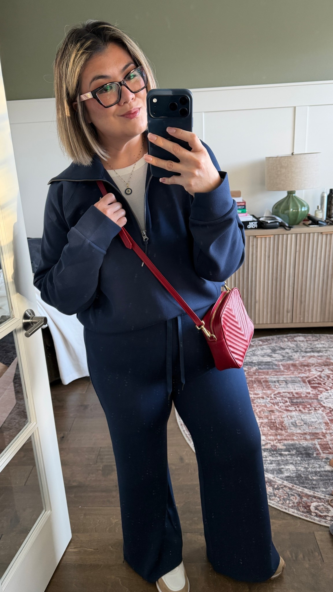 Today’s outfit of the day! I’m running around town today and can’t be bothered with any frills! I wanted something comfortable without looking like a slob 🤪! So I went with something I know that works—enter Spanx AirEssentials! 

I’m wearing the half zip and wide leg pant in True Navy. Size large in the top and size XL in the pant. I’m wearing the pant in the regular inseam as well—I’m 5’5 for reference.

Use promo code: CMCLAIRESPANX to get 15% off your first purchase + free shipping excluding sales. 

#LTKootd #LTKgrwm #LTKMidsize