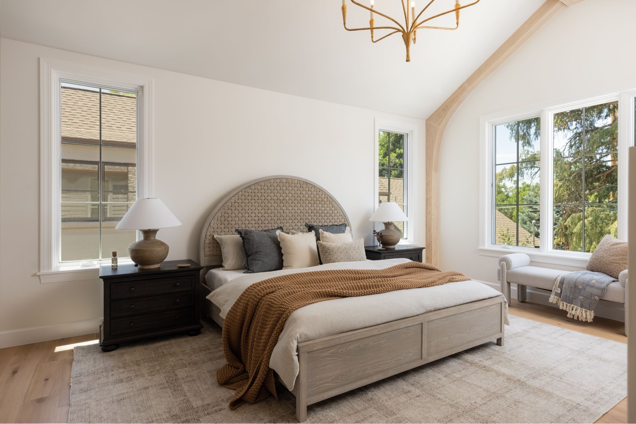 Cane bed, neutral rug, and dark wood nightstands—this primary bedroom feels calm and timeless. 

Primary, rug, neutral, bed, bench, nightstand

#LTKHome