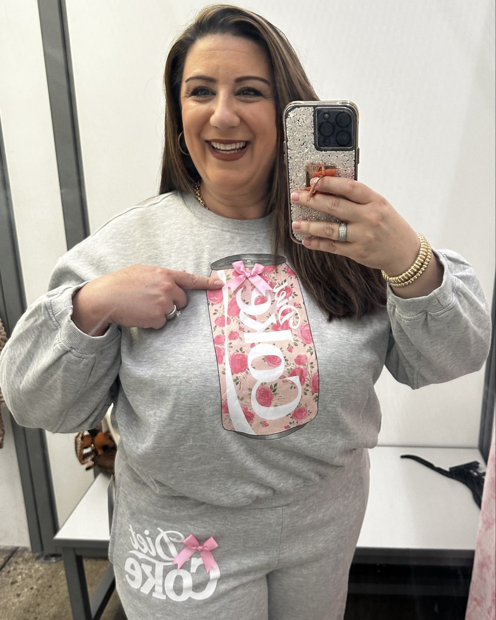They had me with these bow embellishments. It’s cute with the matching sweatpants but I’ve also been wearing it with my wide leg pink jeans too. 

Comment “ Diet Coke “ for the 🔗 or  ✅ my LTK @StylingCurves

For ref I’m a size 16/18 & 5’4:
The sweatshirt is supposed to be oversized however, since this set has gone viral there was only a medium in store left so I tried it on and purchased it. I like a tighter fit so I was happy with the medium but if you want the oversized look make sure to buy true to size. Im wearing the bottoms in a L 12-14. If you have an apron belly or like it loose get true to size.

#loungewear #loungeset #sweatsuit #sweatset #athleisure #activewear
#dietcoke #momonthego #momoutfit #comfyoutfit #casualoutfit #ootd
#dietcokesweatshirt #dietcokesweatsuit
#dietcokeset #size18 #size16 #size14 #size12 #size20 #size10 #pearshape #rectangleshape #hourglassshape #midsize #midsizestyle #midsizefashion #plussizefashion #plussize #plussizestyle #over40style #over50style #over50fashion #over40fashion #curvyfashion #curvystyle #StylingCurves #styleinspo #outfitinspo #shopwithme #affordableclothes 
#affordablefashion #budgetfriendly #affordable #walmartstyle #walmartfashion 
#walmartfinds #walmarthaul 
#walmart #walmartoutfit
#matchingsets #matchingset #loungeset #twopieceset #lougewearset #comfysets #momstyle

#LTKPlusSize #LTKMidsize #LTKActive