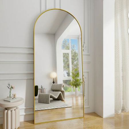 Large gold/brass arch mirror
#walmart

#LTKhome