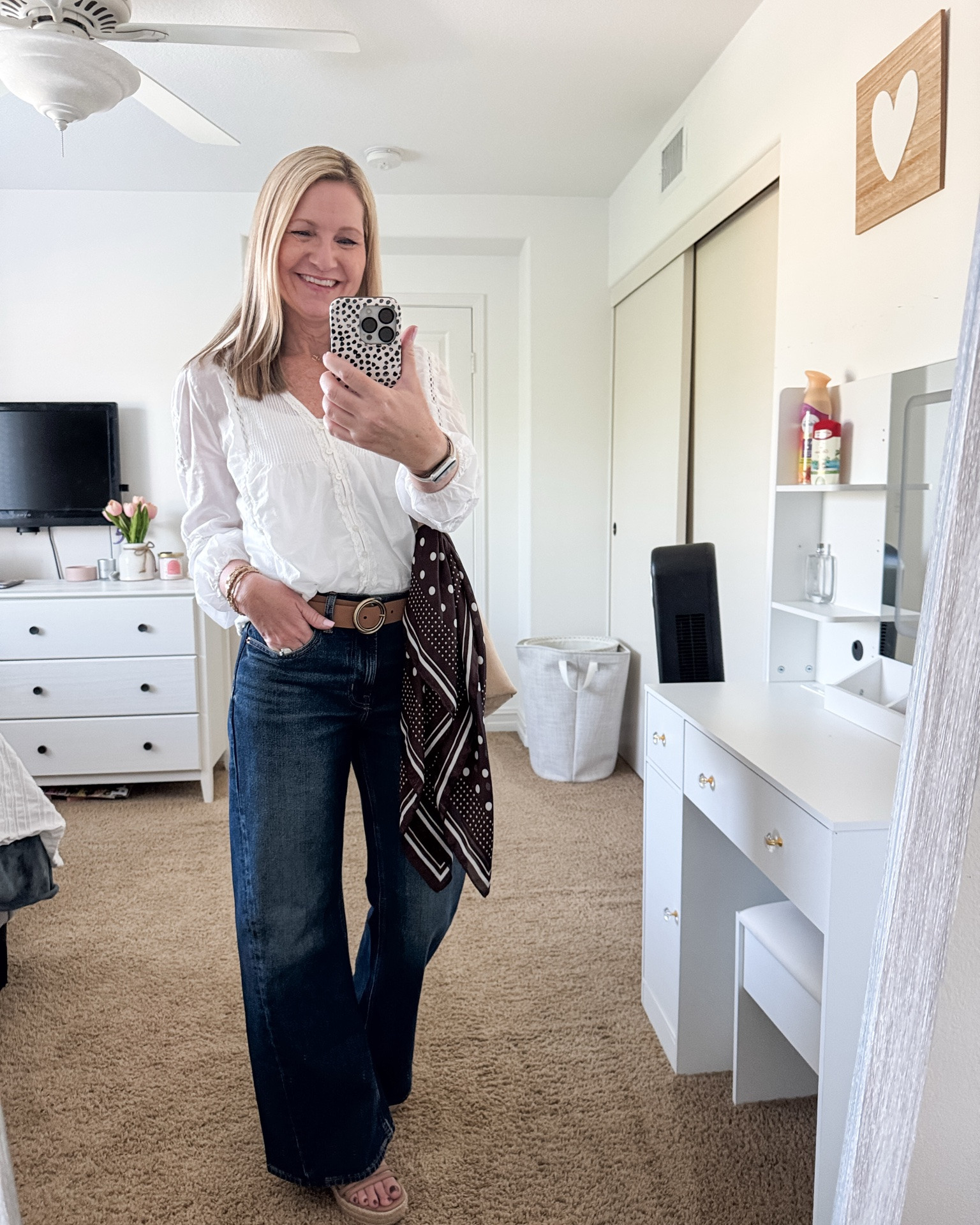 Finding some fun ways to style this pretty chocolate brown polka dot scarf from Target. 

Headed out to dinner over the weekend and played with tying it on my bag both loose and tied in a bow. 

I then added it as a belt to my casual jean and tee look to instantly elevate the look. 

Which one is your favorite?

#LTKOver40 #LTKWorkwear #LTKSeasonal