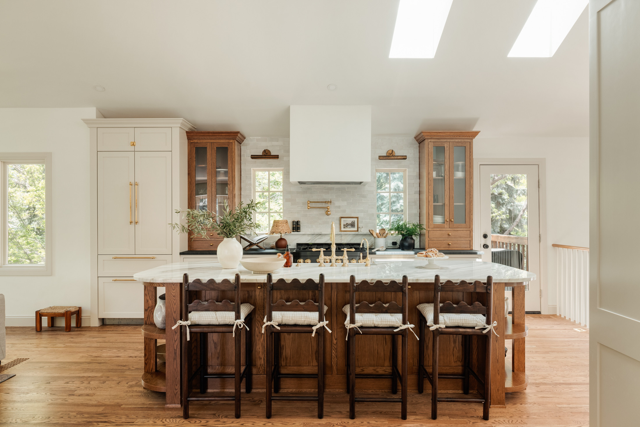 Vintage kitchen barstools and gingham chair cushions. 

 #LTKHome #LTKStyleTip