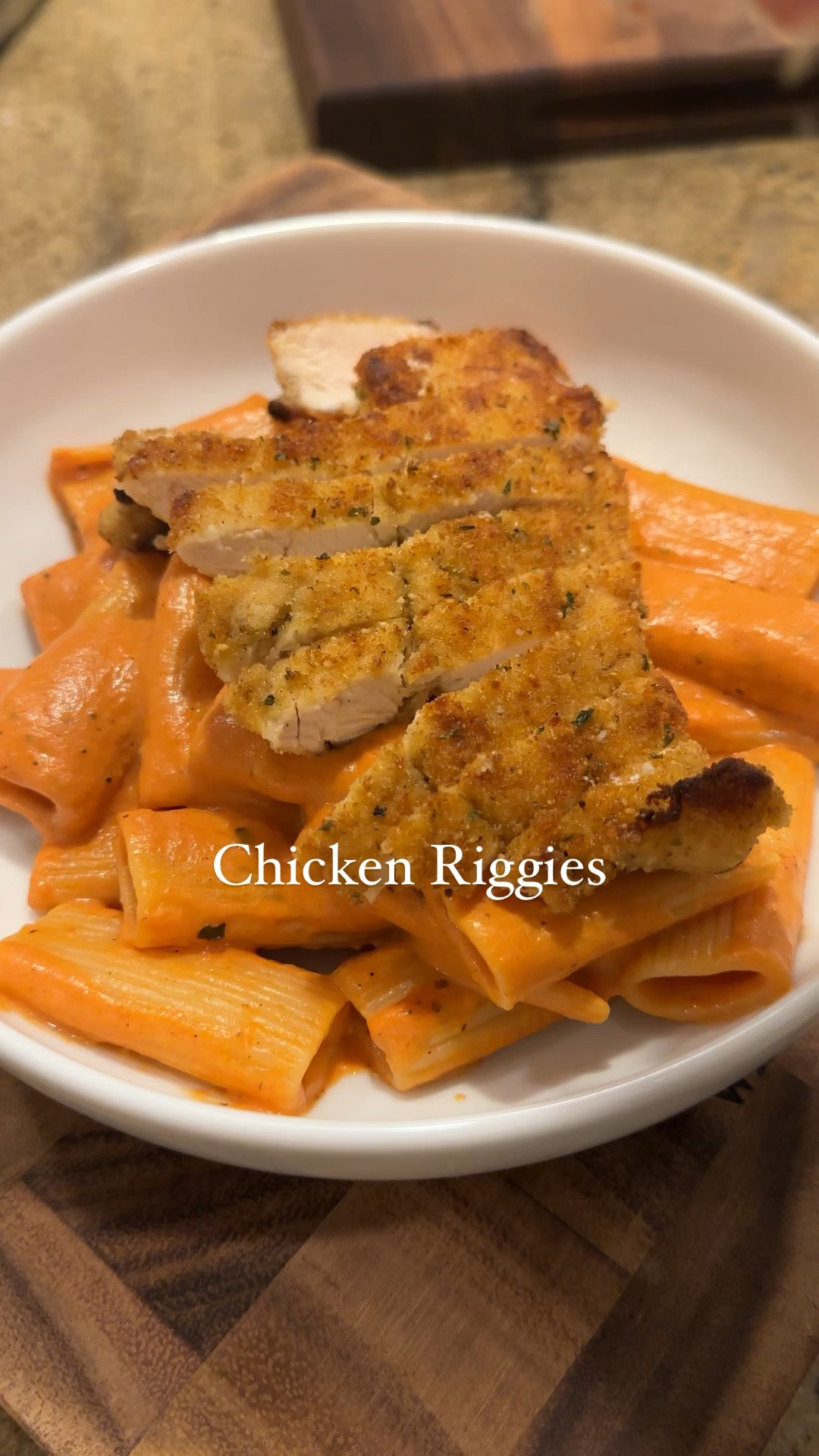 Chicken Riggies

1 6 oz can of tomato paste
2 cloves of garlic, grated
1 cup of heavy whipping cream
1/2 cup freshly grated parmesan cheese
Gibson’s seasoning
2 tbs butter
Pasta
Olive oil

Breaded Chicken Cutlets:
1 lb thinly sliced chicken breast
1/3 cup half and half or heavy whipping cream
1/2 cup panko bread crumbs
1/2 cup Italian bread crumbs
1/2 cup grated parmesan cheese, plus more for garnish
1 cup olive oil
4 tablespoons butter
Gibsons Seasoning Blend  

To make the sauce:
1. Heat a pan with olive oil, add grated garlic and stir for 1 minute.
2. Add tomato paste and seasonings and stir until well combined.
3. Turn down the heat to low, add in heavy cream, stir and let simmer for 15 minutes, stirring occasionally. Then, add in the butter and stir until melted.
4. Pour the sauce over the cooked pasta and stir until fully coated.
5. Slice the chicken cutlets, place ontop, sprinkle with cheese and enjoy!

To make the chicken:
1. Season the chicken with the @gibsonssteakshop blend. Add half and half to coat and mix well.
2. Mix panko, breadcrumbs, cheese, and seasonings in a separate bowl.
3. Take a coated chicken breast and press each side of the chicken into the breadcrumb mixture. Repeat until all are breaded.
4. Heat up a pan with olive oil and butter.
5. Add chicken, two at a time to the pan and fry until golden brown on each side, flipping once.
6. Remove from the pan and drain on a plate lined with a paper towel.
7. Season with a sprinkle of salt. Set aside until ready to serve on pasta.


#LTKVideo #LTKhome