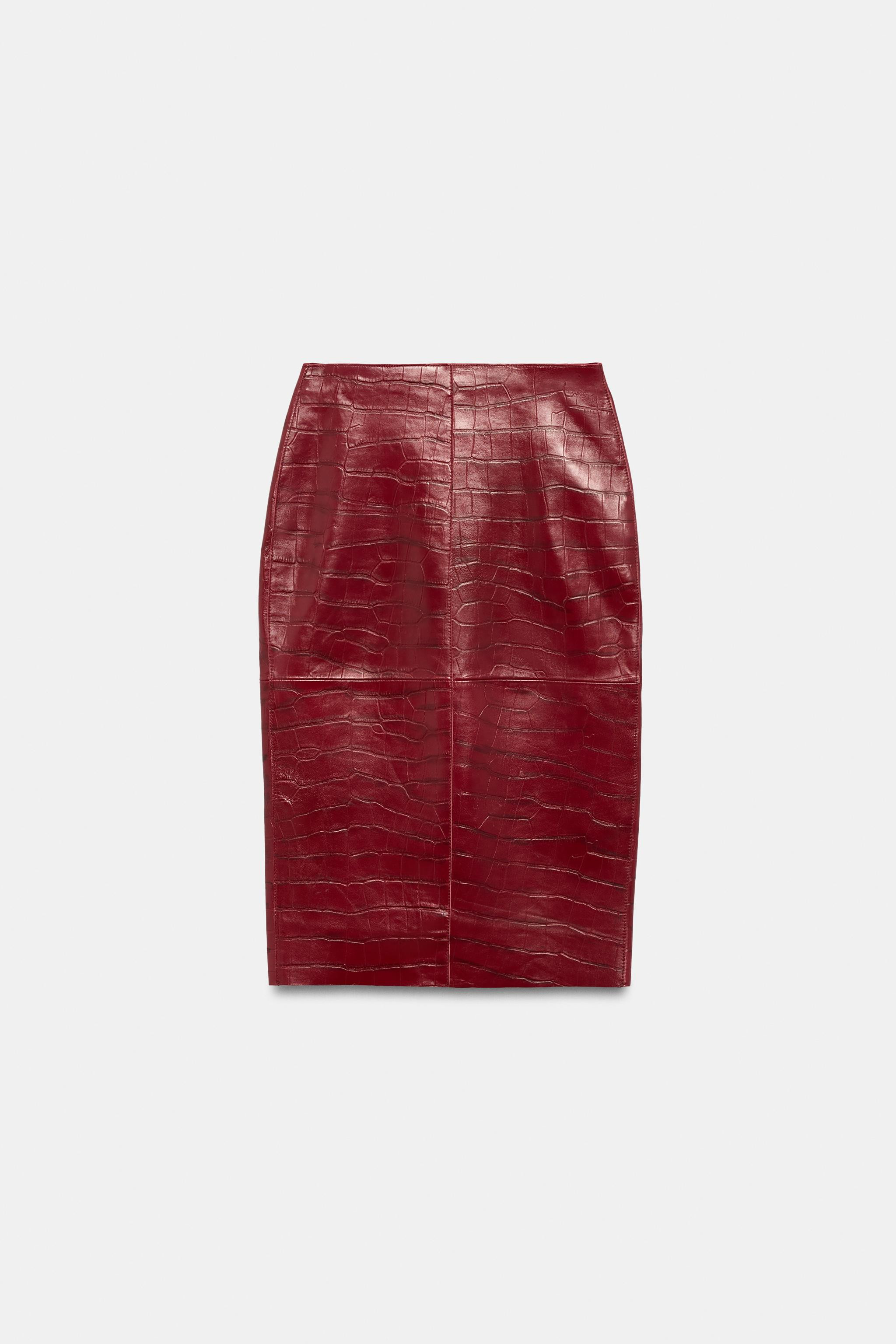 ZARA WOMAN COLLECTION. Mid-rise skirt made of 100% leather. Straight hem with a slit. Back zip fa... | Zara US