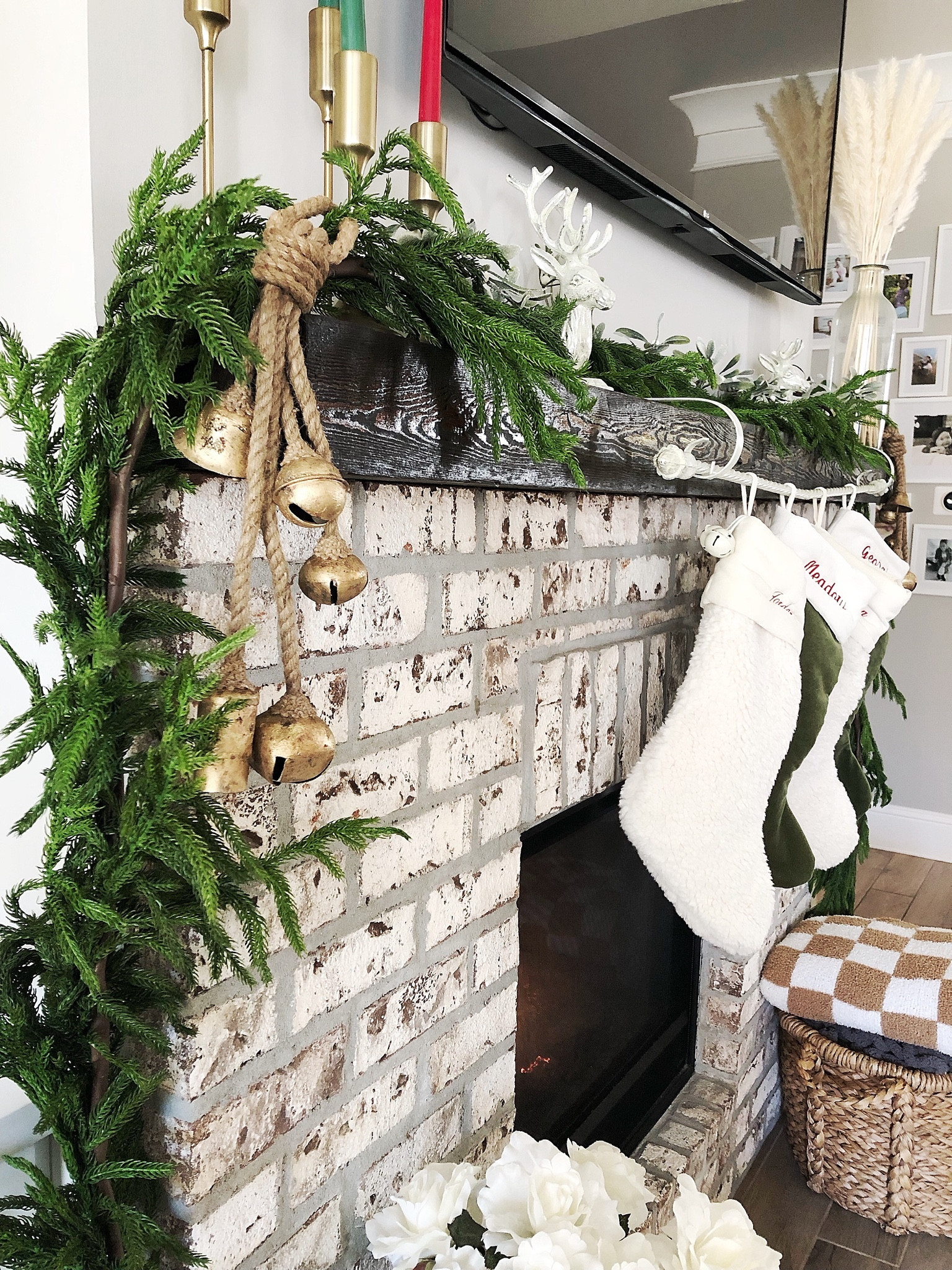 Christmas mantle inspiration! 

I am SO impressed with this garland from Kirklands. It’s currently 25% off and you can choose between 5 ft or 15 ft long. It’s very realistic looking & easy to style! 🎄 

These viral Amazon bells are also AMAZING! They add the perfect touch to the mantle! 🔔 

#holidaydecor #christmasdecor #holidaysathome #amazonfinds #kirklands #potterybarn #pbstockings 

#LTKSeasonal #LTKHoliday #LTKhome