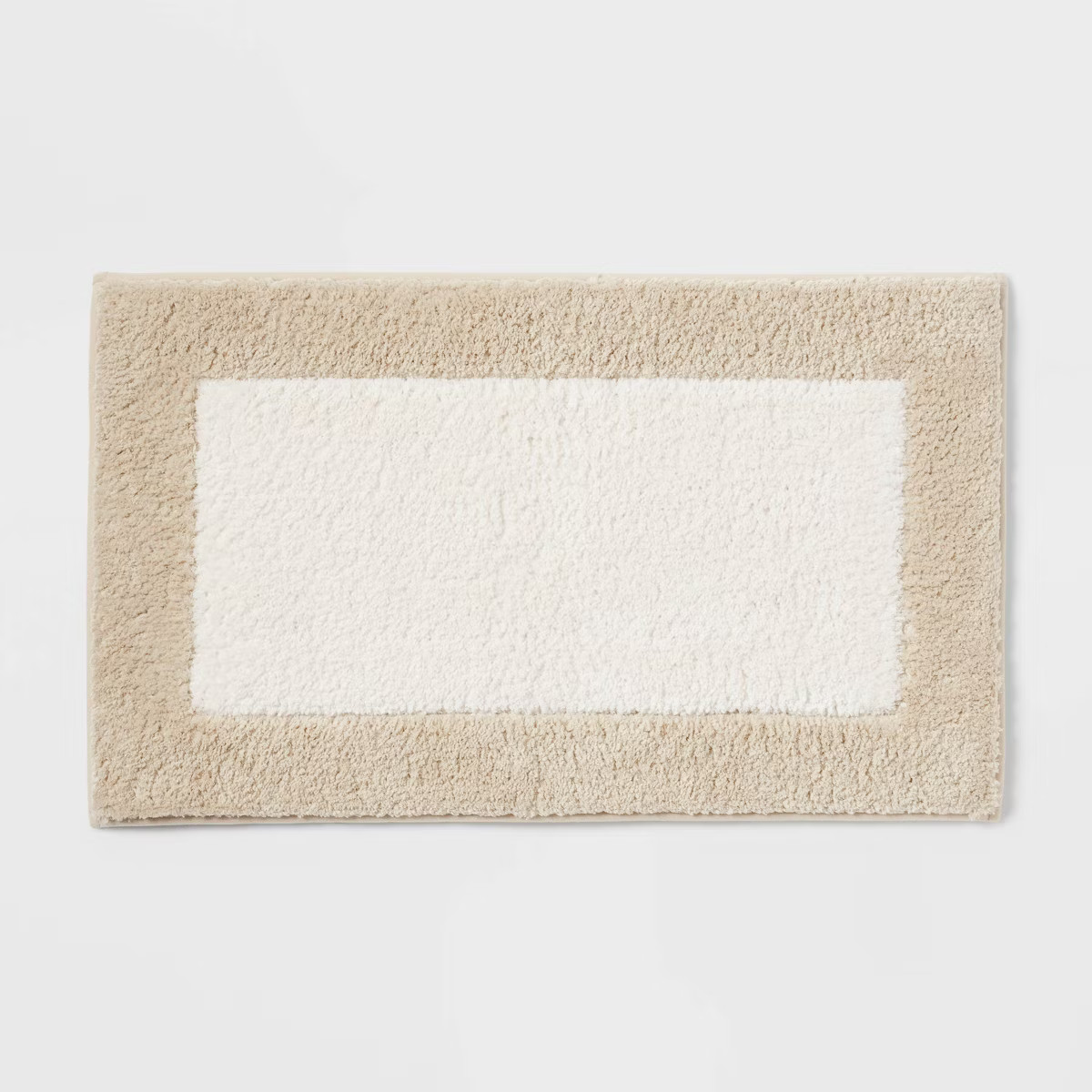 20"x34" Fluffy Border Memory Foam Bath Rug Tan - Threshold™ | Target