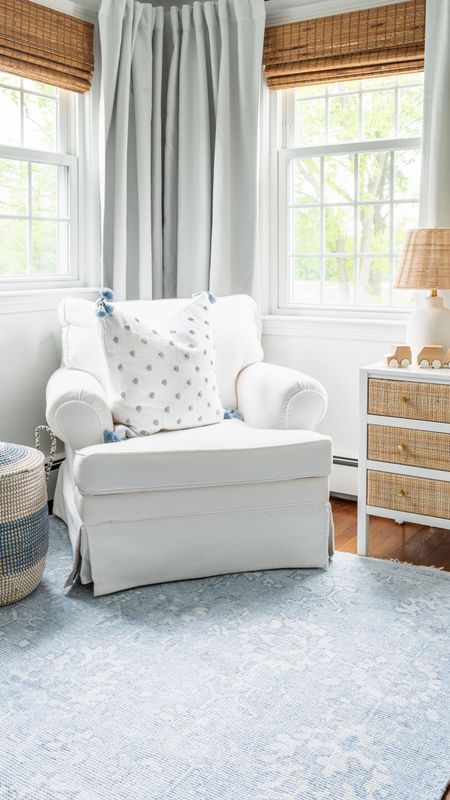 Neutral baby boy, nursery with blue and white decor, Serena and Lily bedding, white glider, white and wicker furniture, seagrass storage baskets, curtains, babies room

#LTKbaby #LTKfamily #LTKhome