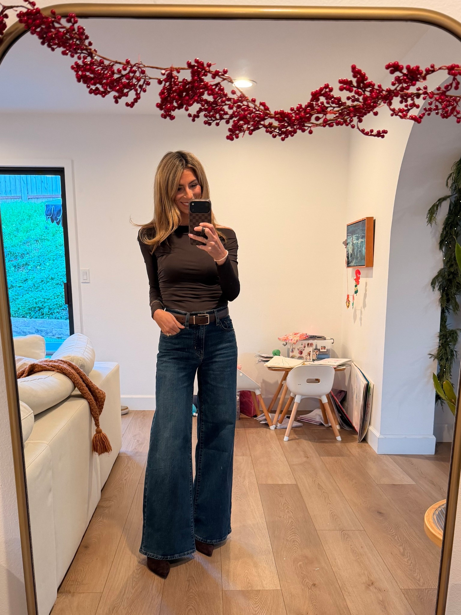 This is the best top & bottom combo! And both very affordable & perfect for holiday outings or date nights!! 

High waisted wide leg jeans, brown boots, black belt, date night outfit, holiday party outfit, brown top

#LTKHoliday #LTKOver40 #LTKootd