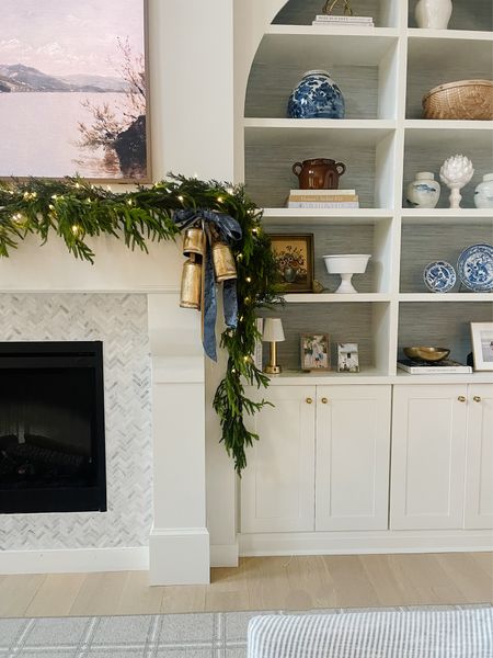 15ft garland now back in stock on Amazon and 66% OFF!! I used the 15ft as the base on our mantle, I love that it’s one solid piece and long enough to drape on either side. #norfolkpine #christmasgarland #mantle 

#LTKsalealert #LTKCyberWeek #LTKHoliday