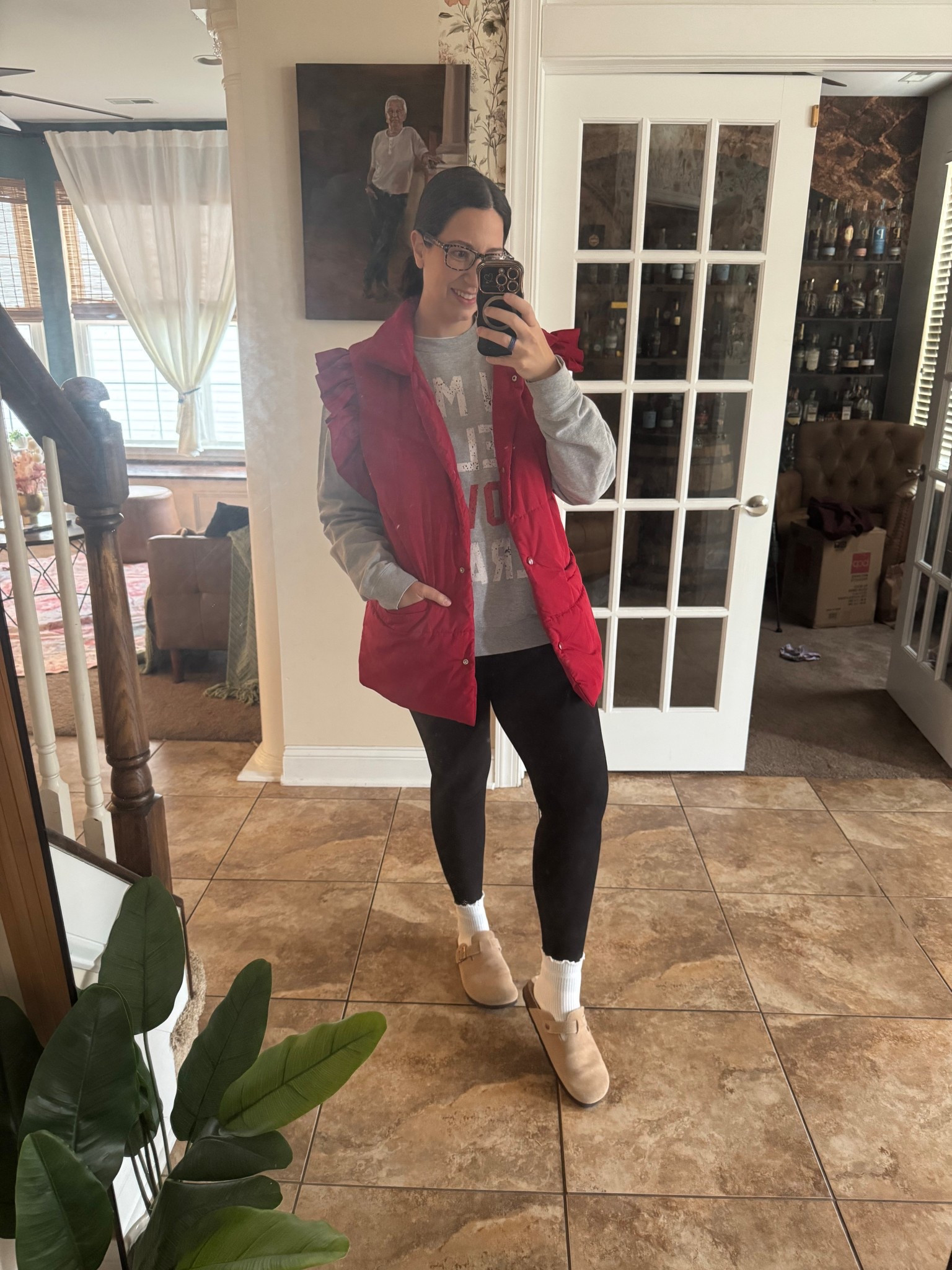 Yes, I still wear leggings with sweatshirts, and proud of it! I added this vest for an extra layer on this cold day. The cute ruffle socks I feel like bring the whole look together. I’m feeling cute but cozy today! My sweatshirt says “In my self love era”. 

#LTKootd #LTKMidsize #LTKmomlife