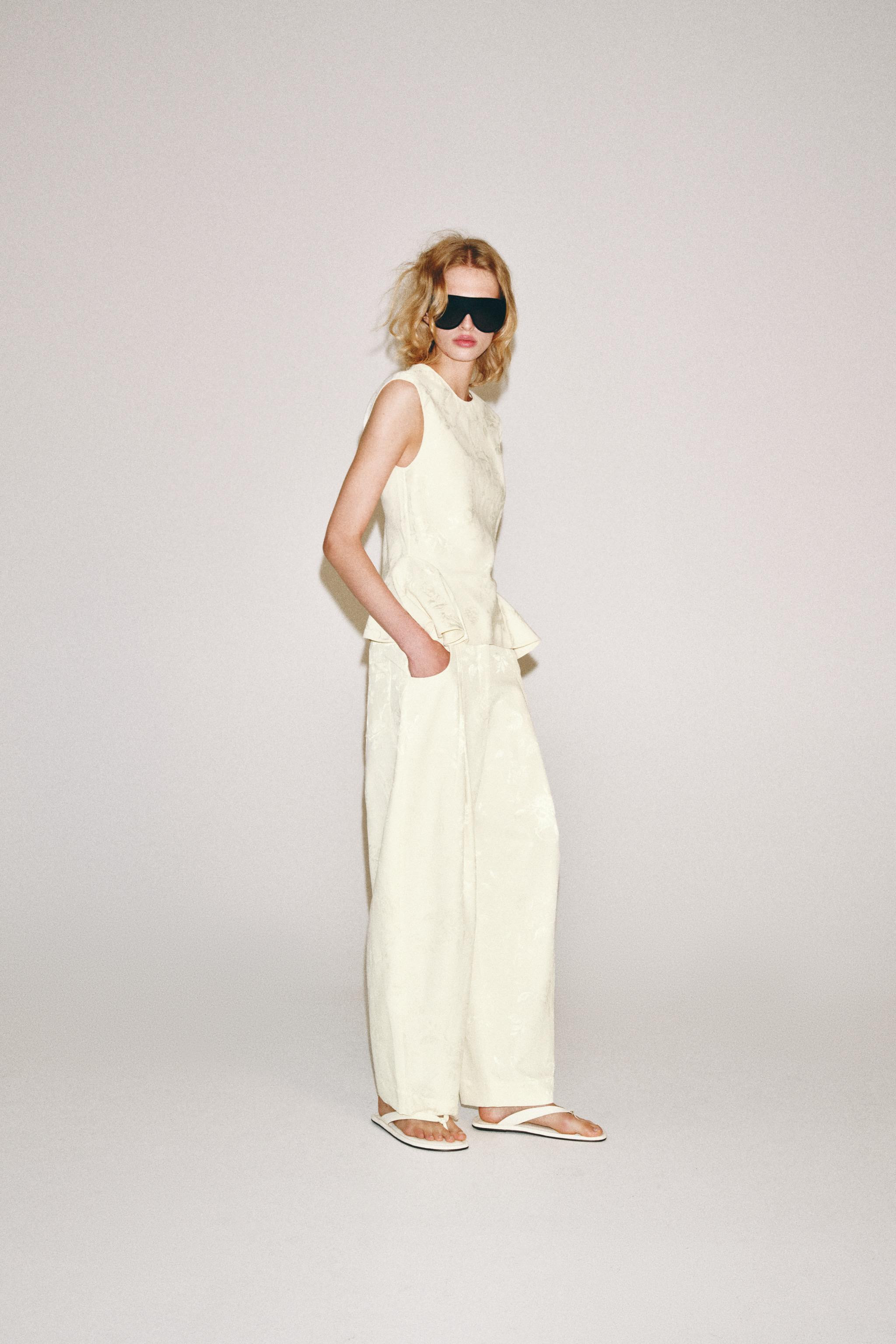 ZARA WOMAN COLLECTIONPants made of a lyocell blend yarn. Mid-rise with belt loops. Side pockets h... | Zara US