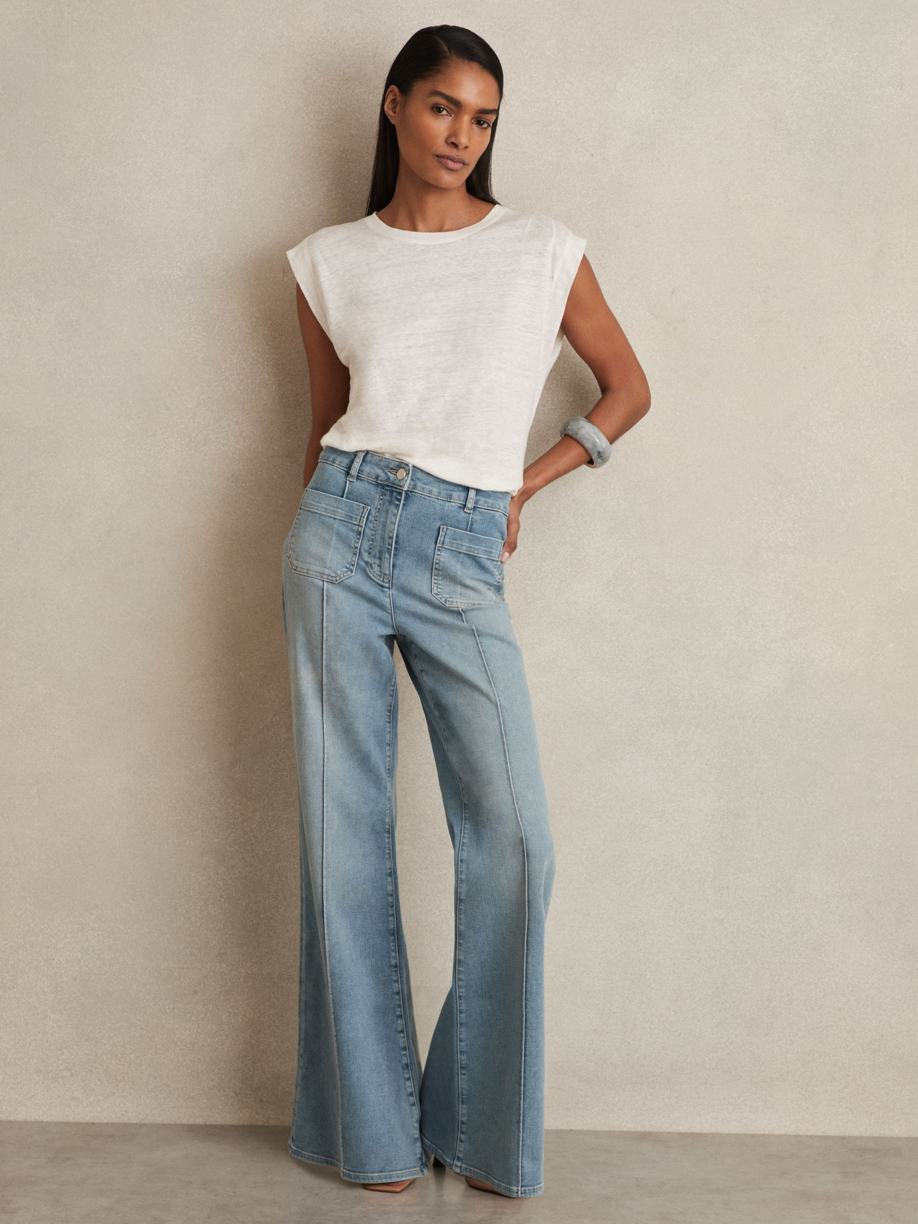 Patch-Pocket Flared Jeans in Light Blue | Reiss US