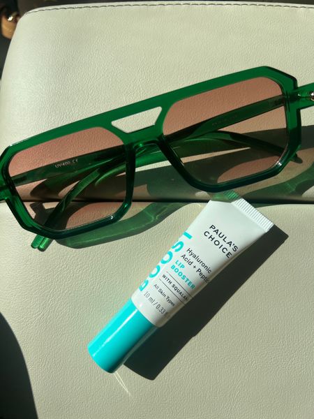 Amazon sunglasses and plumping lipgloss. This has made my lips fuller by using it 3-4 times a day for over a month!!! #meandmrjones 

#LTKfindsunder50 #LTKfindsunder100 #LTKbeauty