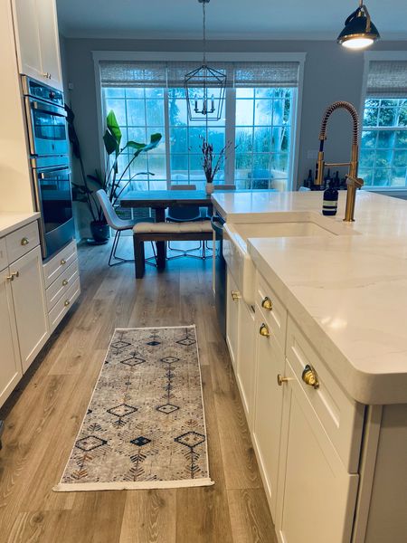 The perfect size runner for your kitchen floor. This rug catches any water spills, wine spills or crumbs with an easy clean up. The pattern is modern boho vibe but could easily sit anywhere. I may need another for my entrance hallway. 


#LTKfamily #LTKhome #LTKstyletip