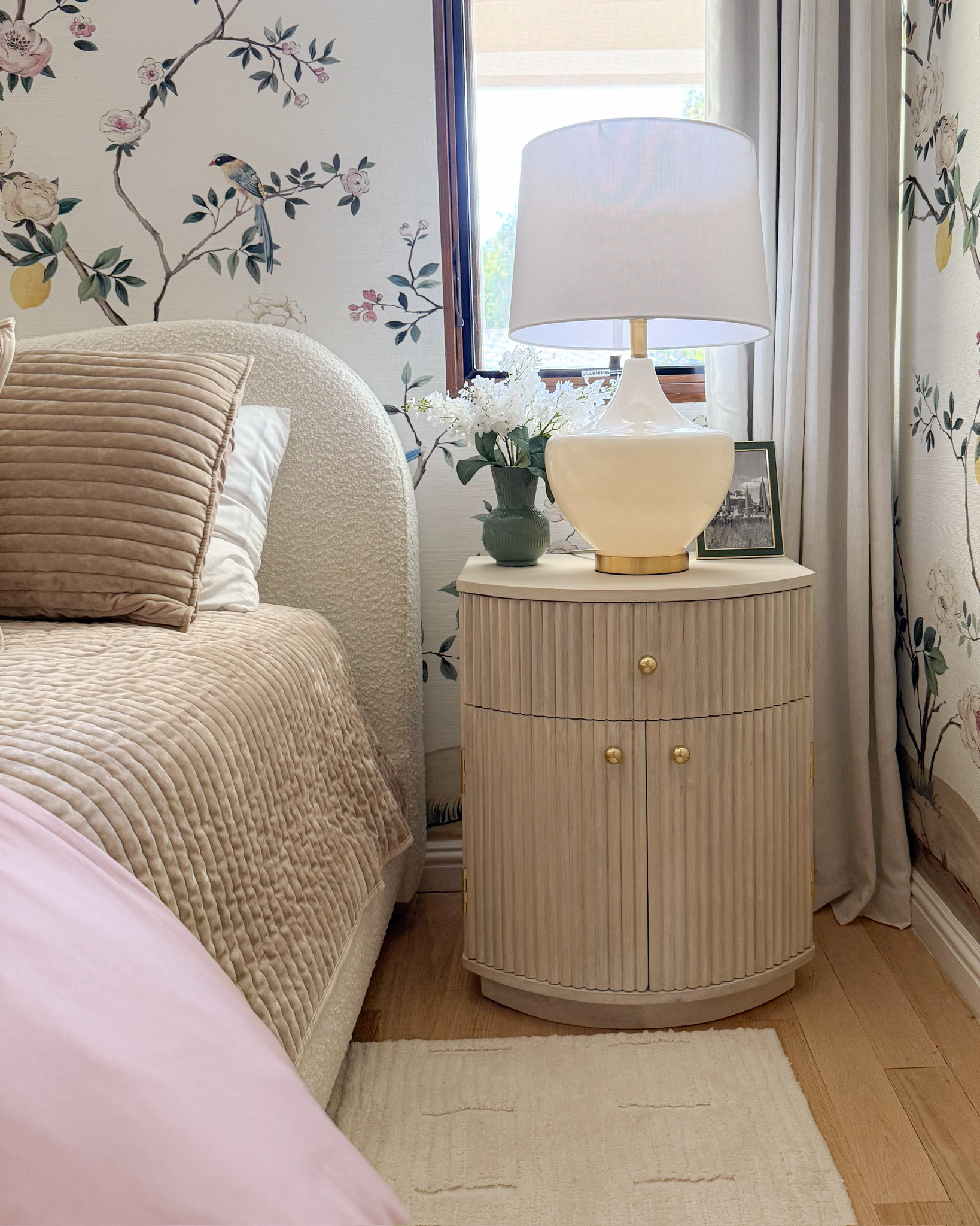 The little details that make guests feel at home ✨ A cozy lamp glow, fresh florals, and a nightstand styled with intention.

#LTKHome #LTKvlog #LTKSaleAlert