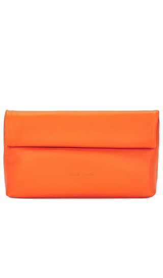 Pillow Clutch in Tangerine | Revolve Clothing (Global)