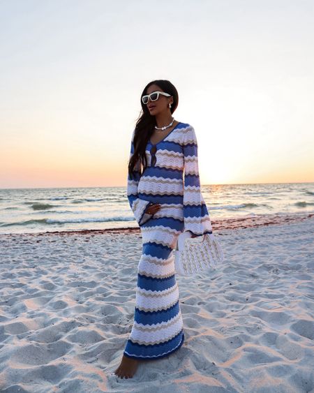 Vacation beach outfit 
Shopbop blue and white knit dress wearing an XS
Seashell bag
Seashell necklace


#LTKTravel #LTKItBag #LTKFindsUnder100