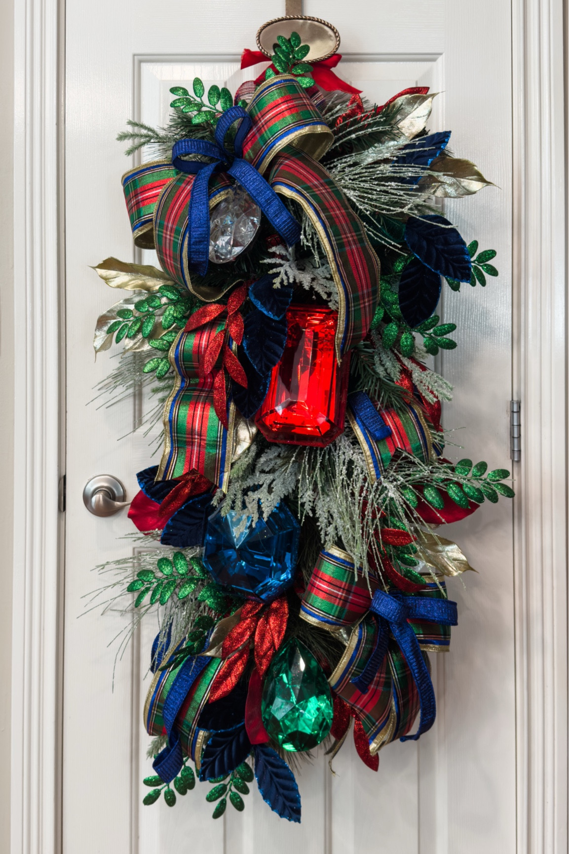 Everything you need to re-create this nutcracker plaid Christmas swag / wreath. Colorful holiday door decorations 

#LTKHome #LTKHoliday #LTKSeasonal