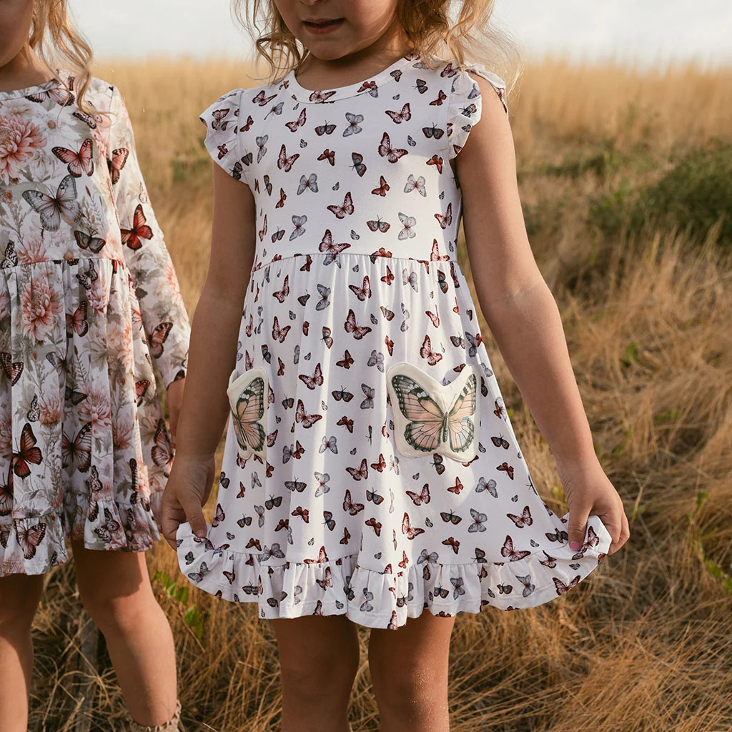 Butterfly White Sleeveless Joan Butterfly Pocket Twirl Dress | Posh Peanut\u00ae | Posh Peanut