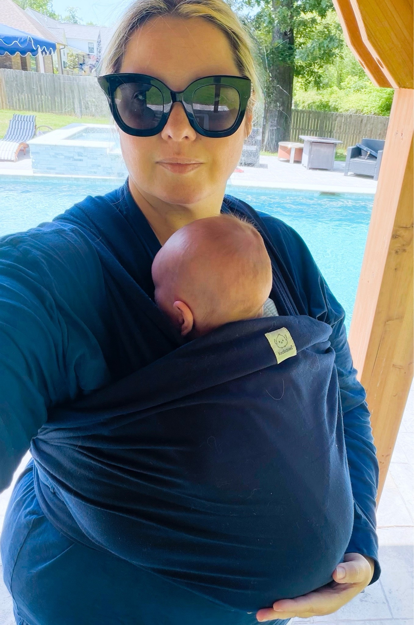 First time in the baby wrap. After watching the tutorial a few times this was pretty easy to do. Love that it comes in lots of colors. Also, works for me as a plus size mom - I just tie it in the back instead of doing another wrap to the front

#LTKdayinmylife #LTKBaby #LTKPlusSize