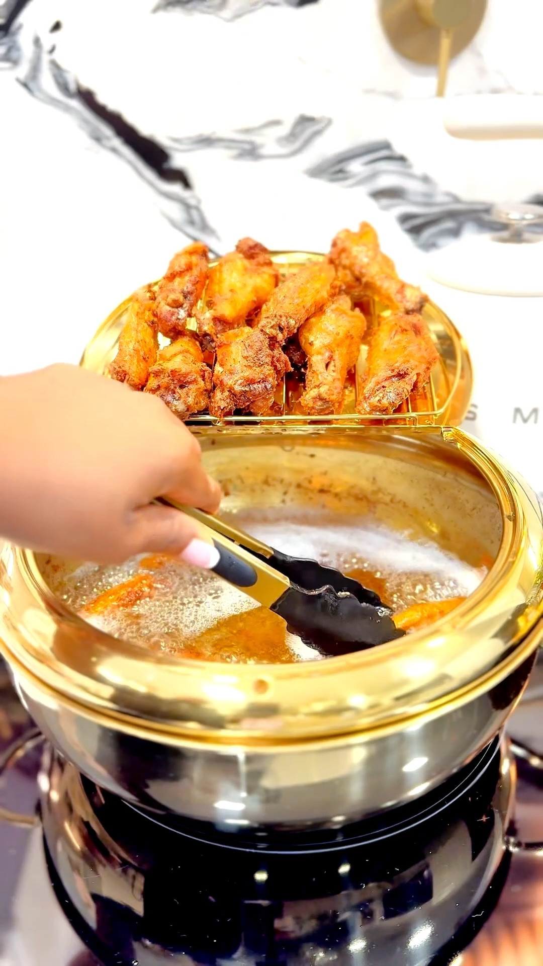 ❇️🤷‍♀️😀Who knew a golden deep fryer pot could actually make me fall in love with frying again? 

❇️I still remember those days when I’d fry chicken, fish or   and oil would be splashing everywhere. 

❇️Honestly, I used to feel like I needed a helmet in my own kitchen 😅.

❇️Even though I have an electric deep fryer, cleaning it and switching the oil was never fun. So when I came across this Japanese style golden deep fryer pot affordable (under $50!) stylish, and beautifully made I had to get my hands on it.

❇️Now, I actually enjoy frying again. The lid design keeps the oil contained, cleanup is a breeze, and it’s so elegant it feels like a decor piece in my kitchen.

❇️Because interior design isn’t just about furniture or decor it’s a lifestyle. It’s about how we live, what we choose, and how every item in our home, from a deep fryer to a vase, can reflect beauty, function, and intention. 

❇️As a mom, interior designer, and business owner, I believe luxury starts with the details and this little golden pot proves it.
❇️
❇️
❇️
#AestheticKitchenFinds #LuxuryOnABudget
#DesignForMoms	#SmartHomeEssentials
#ModernHomeEleganc

#LTKActive #LTKfoodie #LTKHoliday