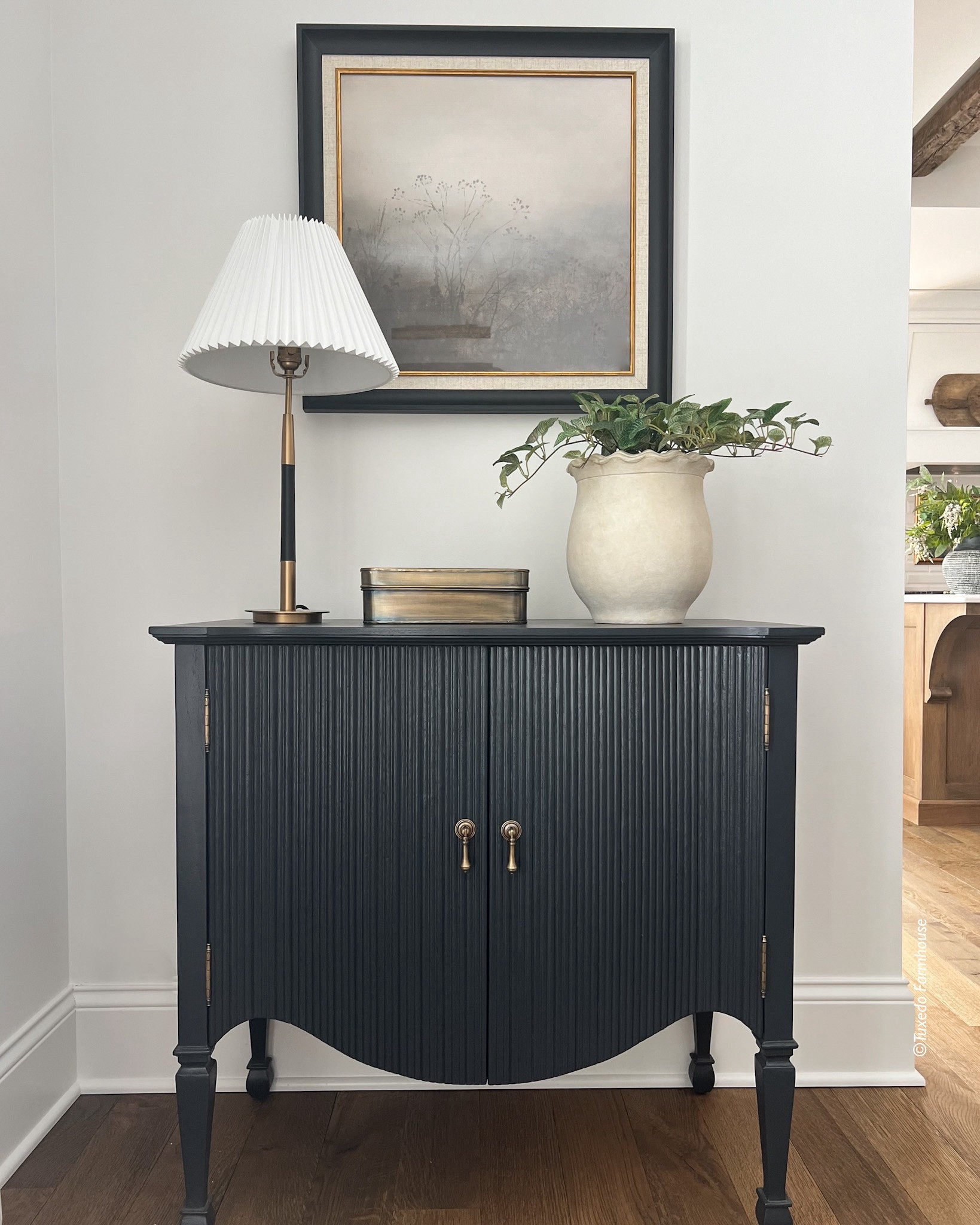 Style is simple with a gorgeous cabinet, art, florals or a plant, a lamp and decor
object.

Seasonal, home decor, spring, vases, cabinet, lamps, wall art 

 #LTKSeasonal #LTKHome #LTKFindsUnder100