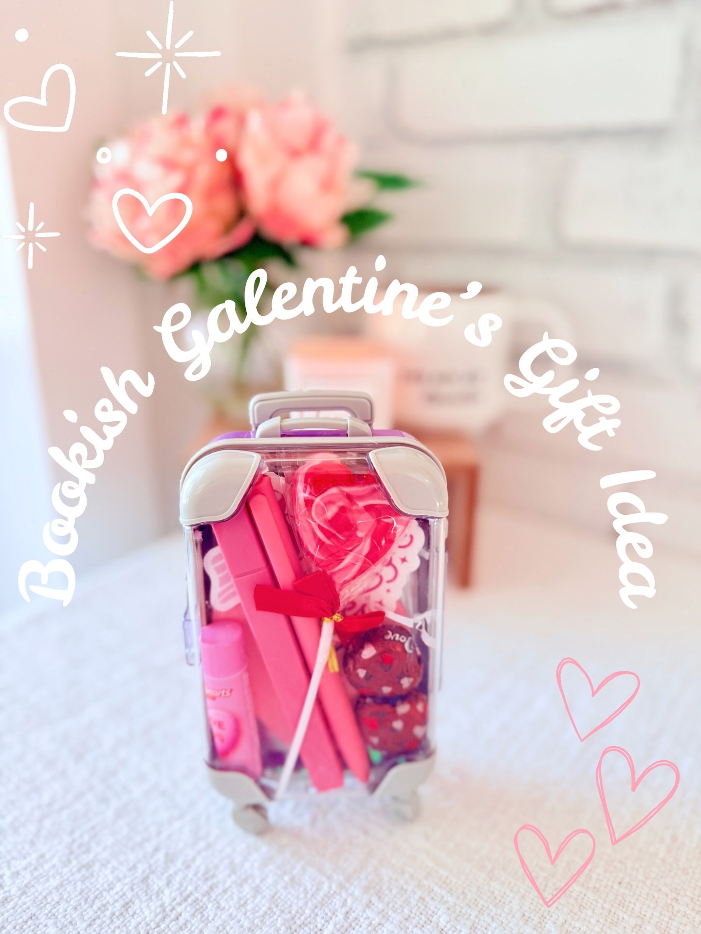 ✨Bookish Galentine's Day Gift Idea✨

Here is another fun bookish gift idea. I have to say I'm  slightly obsessed with how these turned out, and although these are the perfect Galentine's Day gift I really think you could use them for any occasion. They would be great for book club too.

I found these little suitcases that actually wheel around and are the perfect size for annotation supplies and a few other things. Below is what I included in mine.

🩷 Heart under eye patches for a little self-care Sunday
🤍 Valentine's chapstick - I thought this was cute, but you could do any kind of lip balm 
🩷 Annotation tabs - I tried to stick to Valentine's Day colors, but you could do any theme here 
🤍 Heart transparent sticky notes because love 
🩷 Pen and highlighter
🤍 Bookish stickers from @paper_and_glow and @myblendedbookshelf - you can never have too many and look at how cute these are 😍
🩷 Valentine's Day sucker and heart chocolates - any candy would work 

I found this cute little bow sticker and stuck it on the front too. You could also throw in a gift card. I put a little crinkle paper in the bottom and put the pen and highlighter at an angle to fit.

Don't forget to save this for later and send this to someone who needs gift inspiration.

💭 What is your favorite Valentine's candy?

#LTKselfcare #LTKSeasonal #LTKValentine