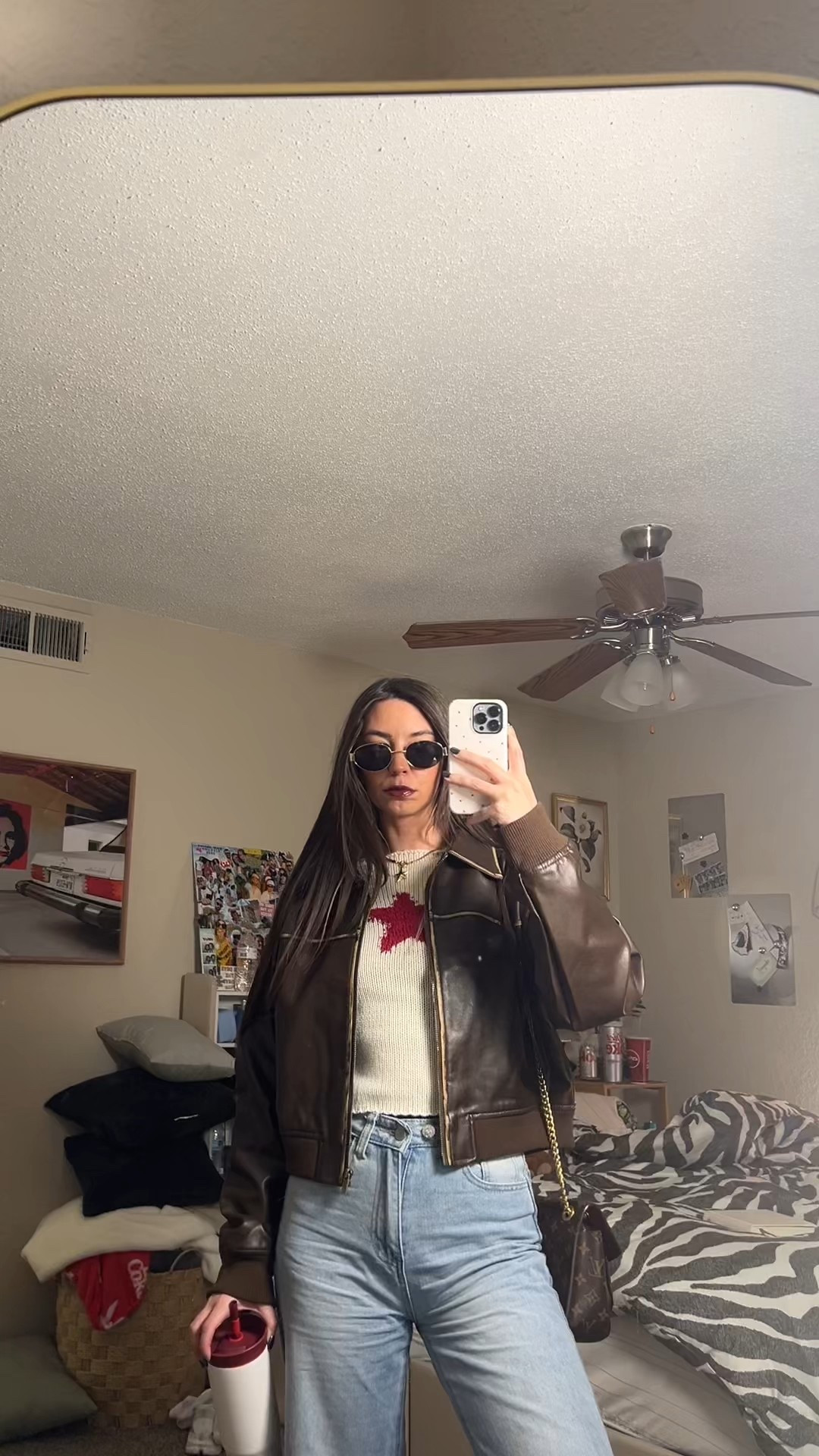 Keywords: leather jacket outfit, cropped leather jacket, brown leather jacket, casual chic outfit, fall layers, neutral outfit, everyday outfit, straight leg jeans, distressed denim, baggy jeans outfit, off duty style, street style look, vintage inspired outfit, capsule wardrobe, LTK outfit, LTK finds, fall fashion
Effortless with a vintage edge 🤍 This cropped brown leather jacket is the perfect statement layer for cooler days. Styled with a cozy knit sweater and relaxed distressed jeans for an easy, lived-in look that still feels put together. Comfortable, timeless, and endlessly wearable—perfect for errands, casual plans, coffee dates, or weekend outings. A go-to outfit that never goes out of style.

#LTKValentine #LTKootd #LTKdayinmylife