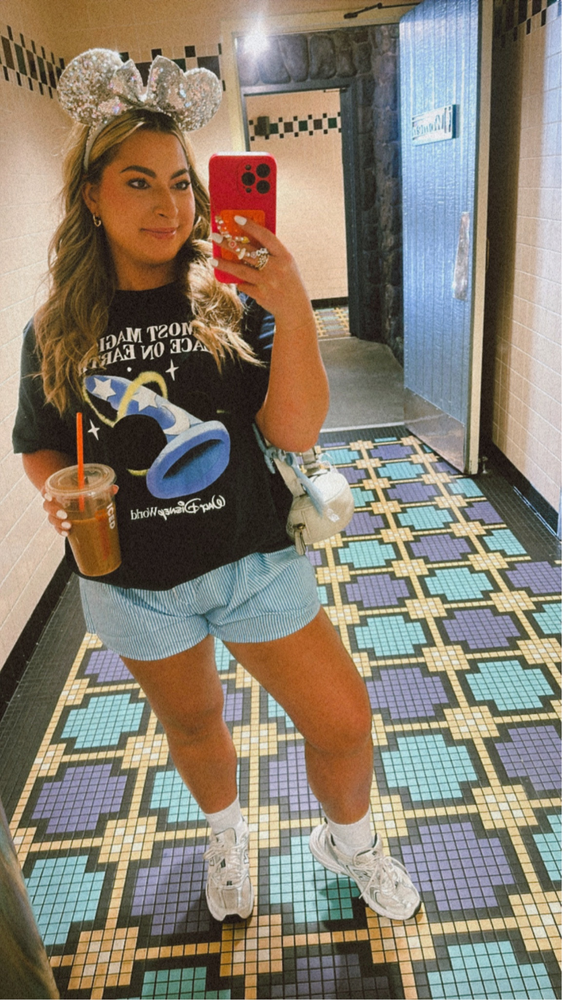 Disney Hollywood studios outfit :
Sorcerer Mickey Happiest place on earth tee 
Women’s blue stripped boxer shorts
Silver original Walt disney world Minnie ears 
New balance sneakers 
White cross body bag decorated with bows 

#LTKSeasonal #LTKtravel #LTKstyletip