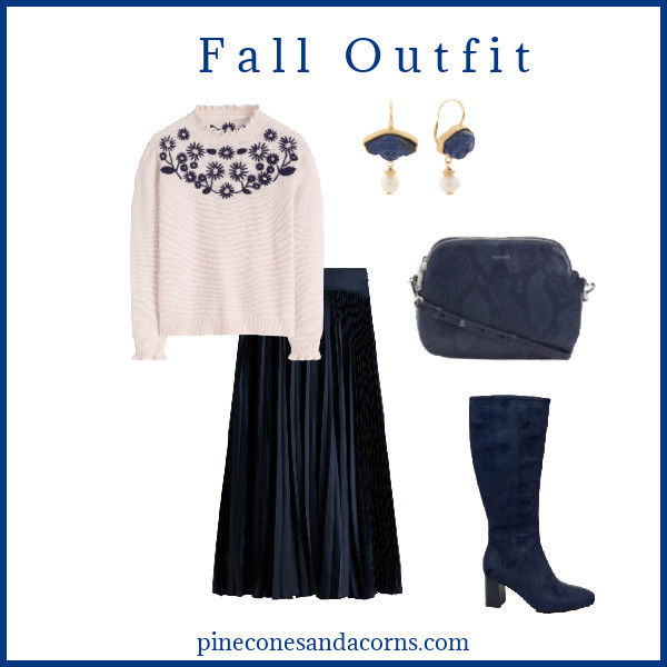 Navy blue is the perfect color for Fall. Pull out your favorited pleated skirt, boots and bag and pair them with a beautiful blue and white sweater from Boden.  

 #LTKFallSale #LTKSeasonal #LTKOver40
