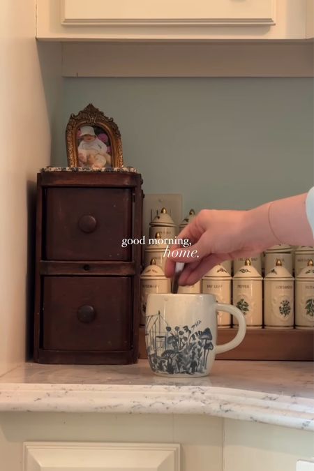 Restored vintage sewing machine used for coffee accessory storage and vintage spice jars for some added kitchen decor

#LTKhome