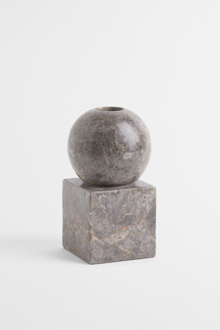 Small candlestick in marble with a cubical base and spherical top. Diameter of candle holder appr... | H&M (US)