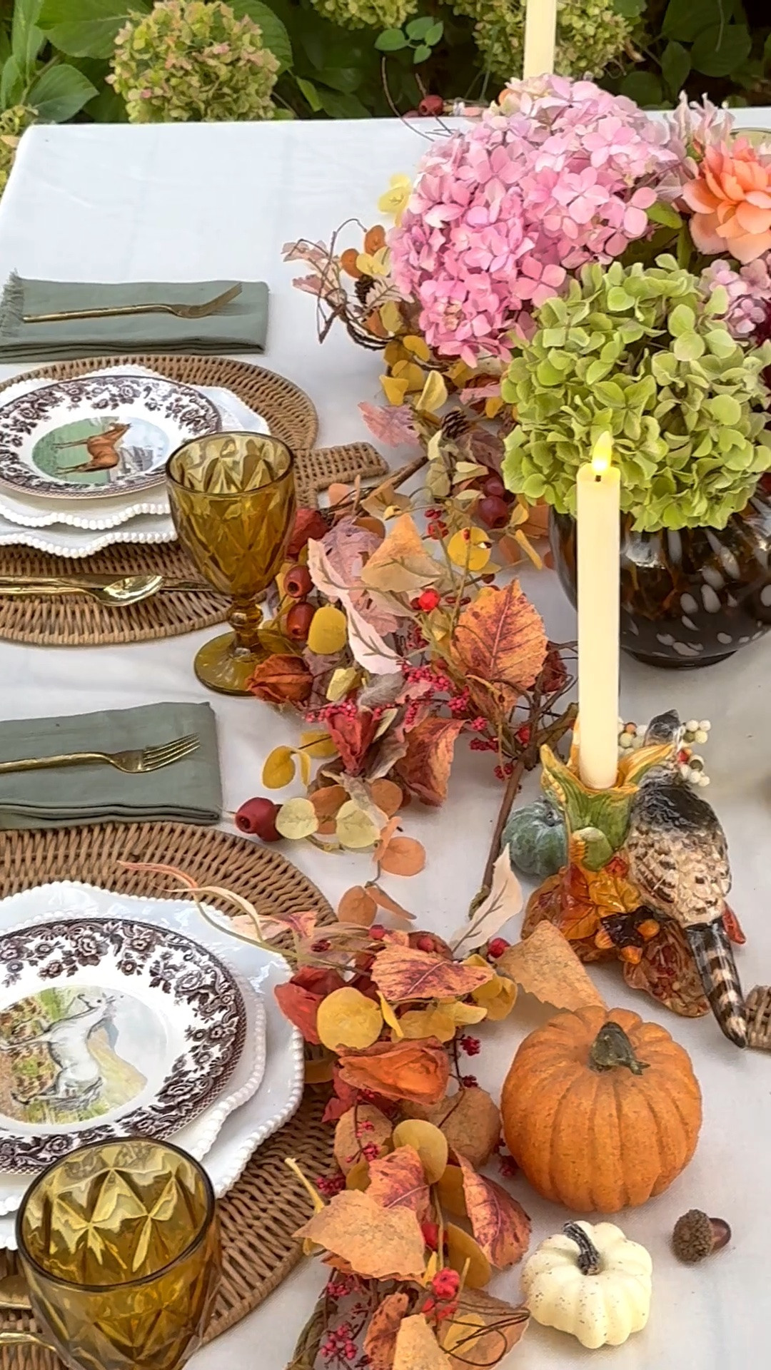 #ad Here in Nirthern California we love dining outdoors during the fall months, especially for Thanksgiving and Friendsgiving! This beautiful Thanksgiving tablescape is easy to recreate with fall garlands, horse plates, pheasant candleholders, sage green fringe napkins, white Perlette plates, and a classic cream tablecloth from @Wayfair ❤️ #wayfair #wayfairpartner