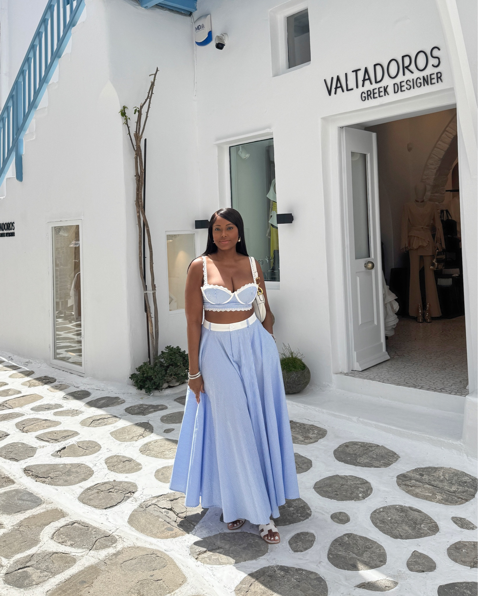 My Mykonos Day 2 outfit — I kept getting stopped in this 2 piece skirt set ☺️. So dreamy, effortless, linked below ✨
.
European summer , vacation looks , resort wear, travel style 
