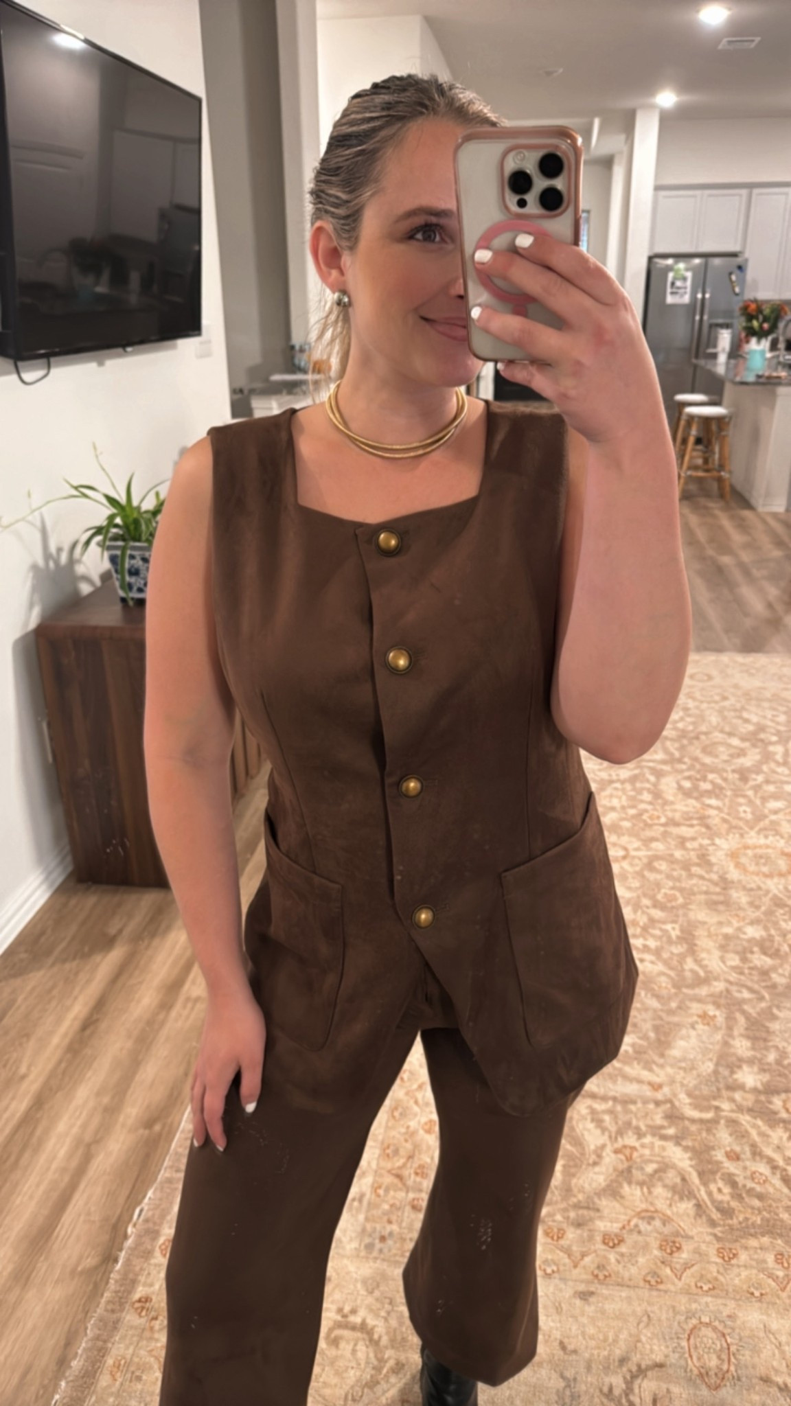 Wearing a size medium in the top and size 28 in the pants! The top runs a little big but I prefer my tops to be a little loose. 

Fall workwear - fall work outfits - business casual - brown tops - brown pants - work pants - vest tops - Maeve Faux-Suede Cutaway Vest - suede pants - winter workwear - office fashion 


#LTKSeasonal #LTKOver40 #LTKWorkwear