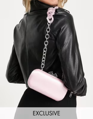 True Decadence Exclusive cross body bag in pink satin with resin chain strap | ASOS (Global)