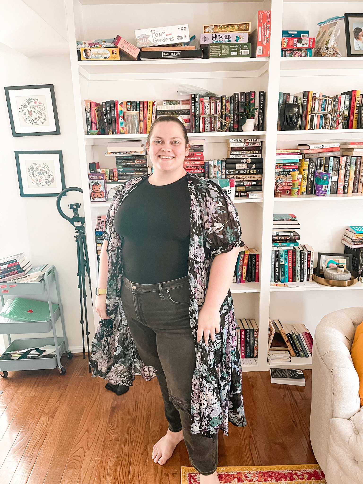 Plus-size outfit, plus-size jeans, plus-size summer outfit, reading room, reading nook, bookshelves, books, reading chair, floral wrap, floral kimono, black jeans

#LTKstyletip #LTKhome #LTKcurves