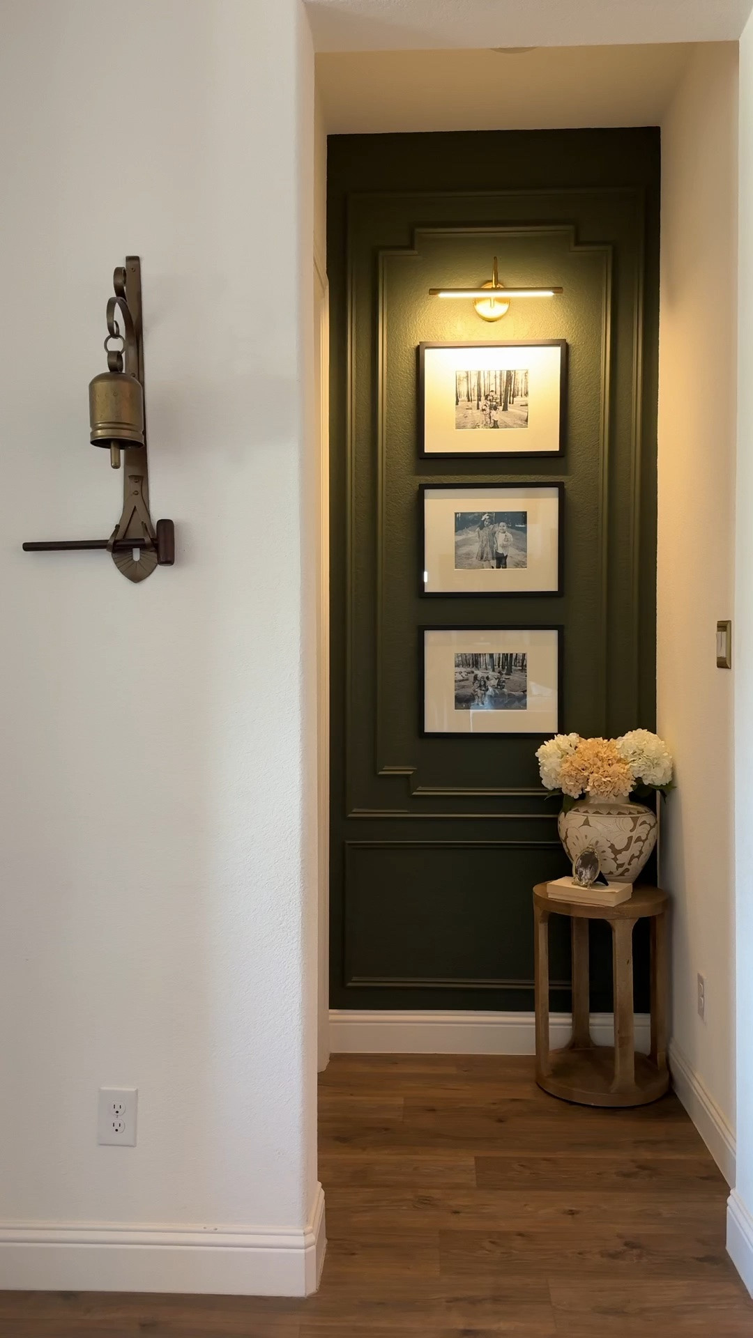 Entryway decor | Hallway decor | Small entryway | Entryway nook | Foyer inspiration | Gallery wall | Family photo wall | Picture frame molding | Wall molding | Moody green walls | Dark green paint | Picture light | Traditional home | Transitional home | Collected home | Timeless interiors | Accent table | Pedestal table | Ceramic vase | Faux florals | Warm wood tones | Cozy home | Vintage inspired decor | Nancy Meyers style | Home styling

#LTKSeasonal #LTKHome