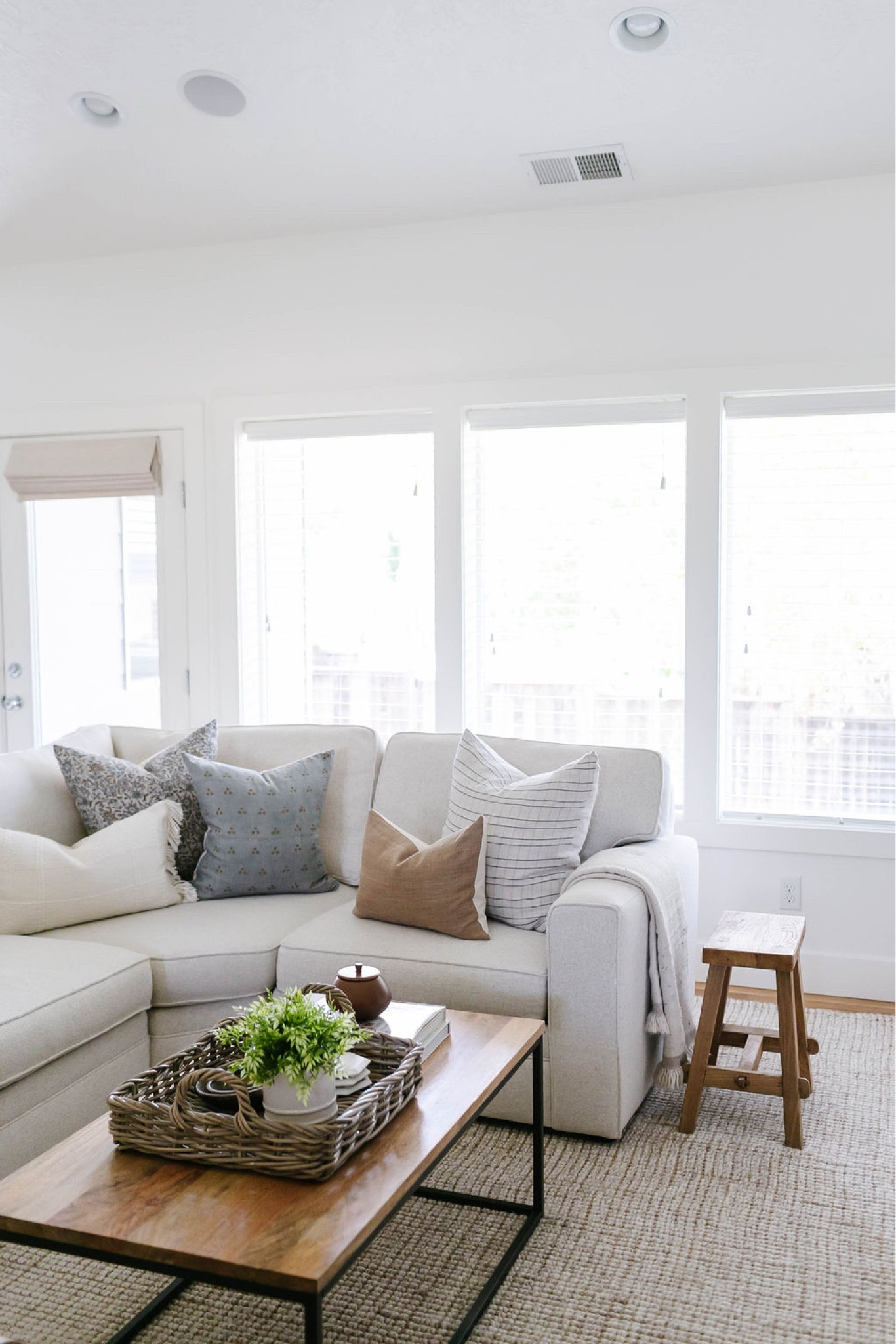 Target Studio McGee, vintage wood stool, wood side table, fall decor, fall pillows, throw pillows, coffee table decor, home decor, living room decor, Pottery Barn Pearce sectional, neutral sofa, neutral couch, Pottery Barn wool jute rug, 