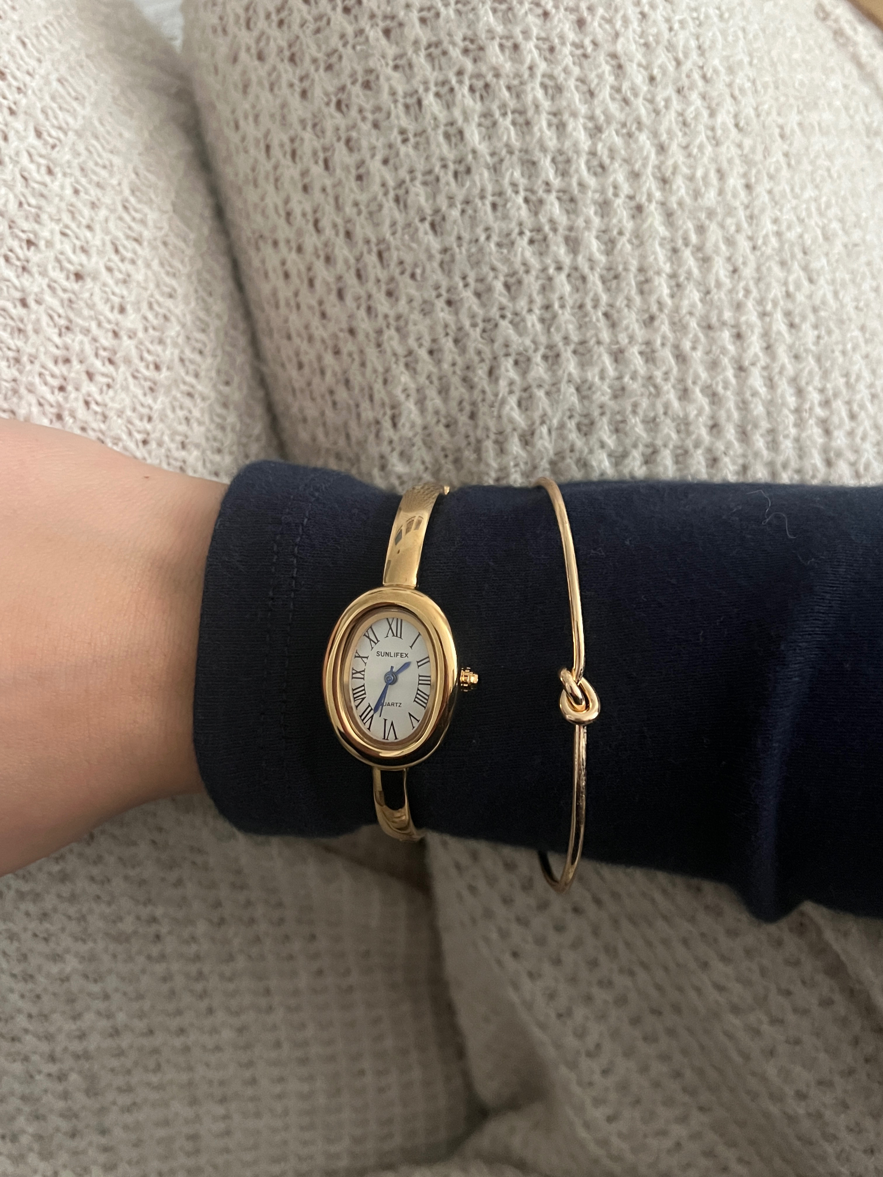 watch/bracelet stack + others
(cartier watch dupe; aerie waffle pants; brandy melville navy long sleeve; gold bracelet) #LTKoutfit #LTKwatch 

 