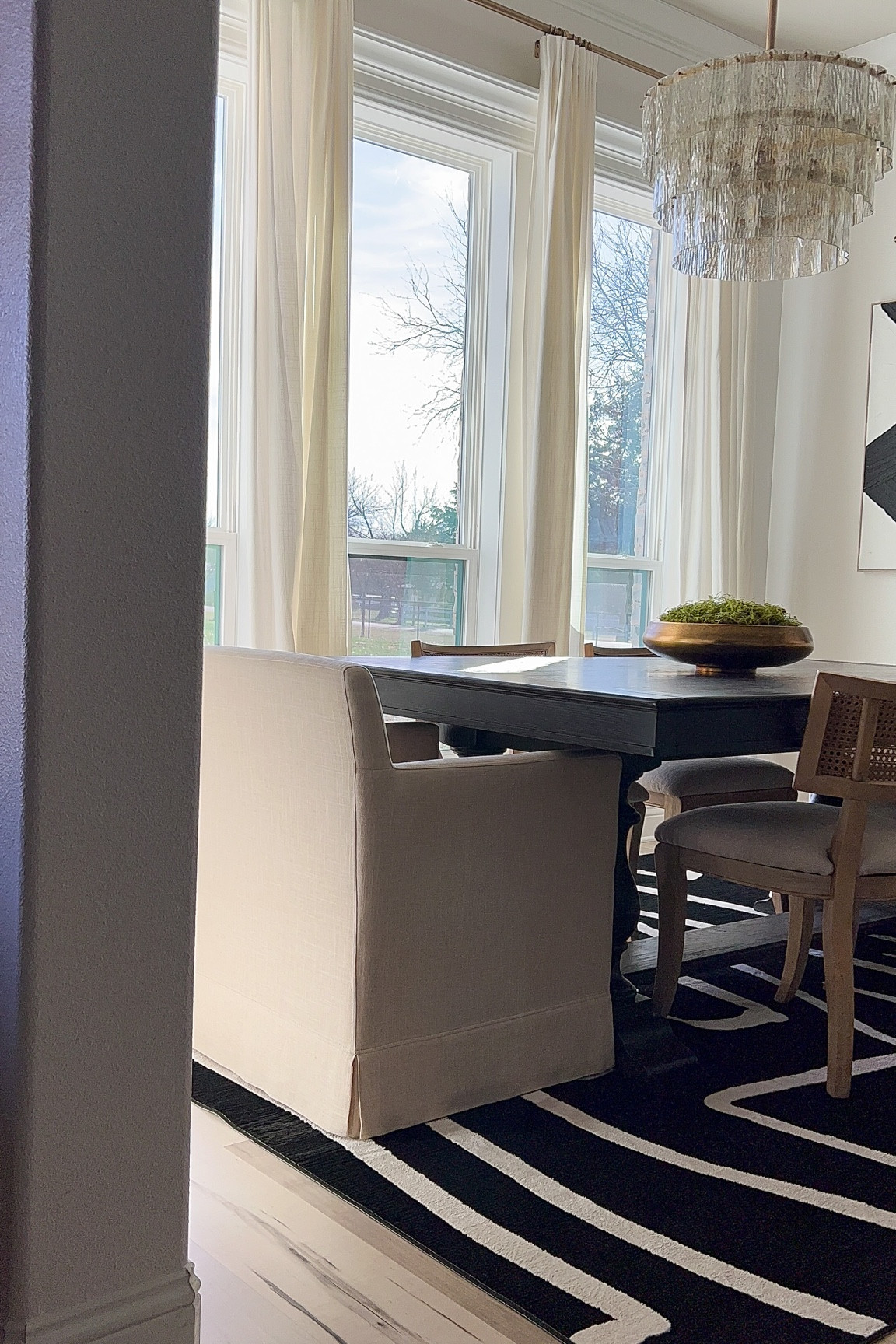 My new brass bowl is absolutely beautiful in person! I love it so much! 

Dining room, black and white home decor, CB2, brass, gold, moss bowl, centerpiece, white chairs, dining chair, chandelier. 

#LTKunder100 #LTKSale #LTKhome