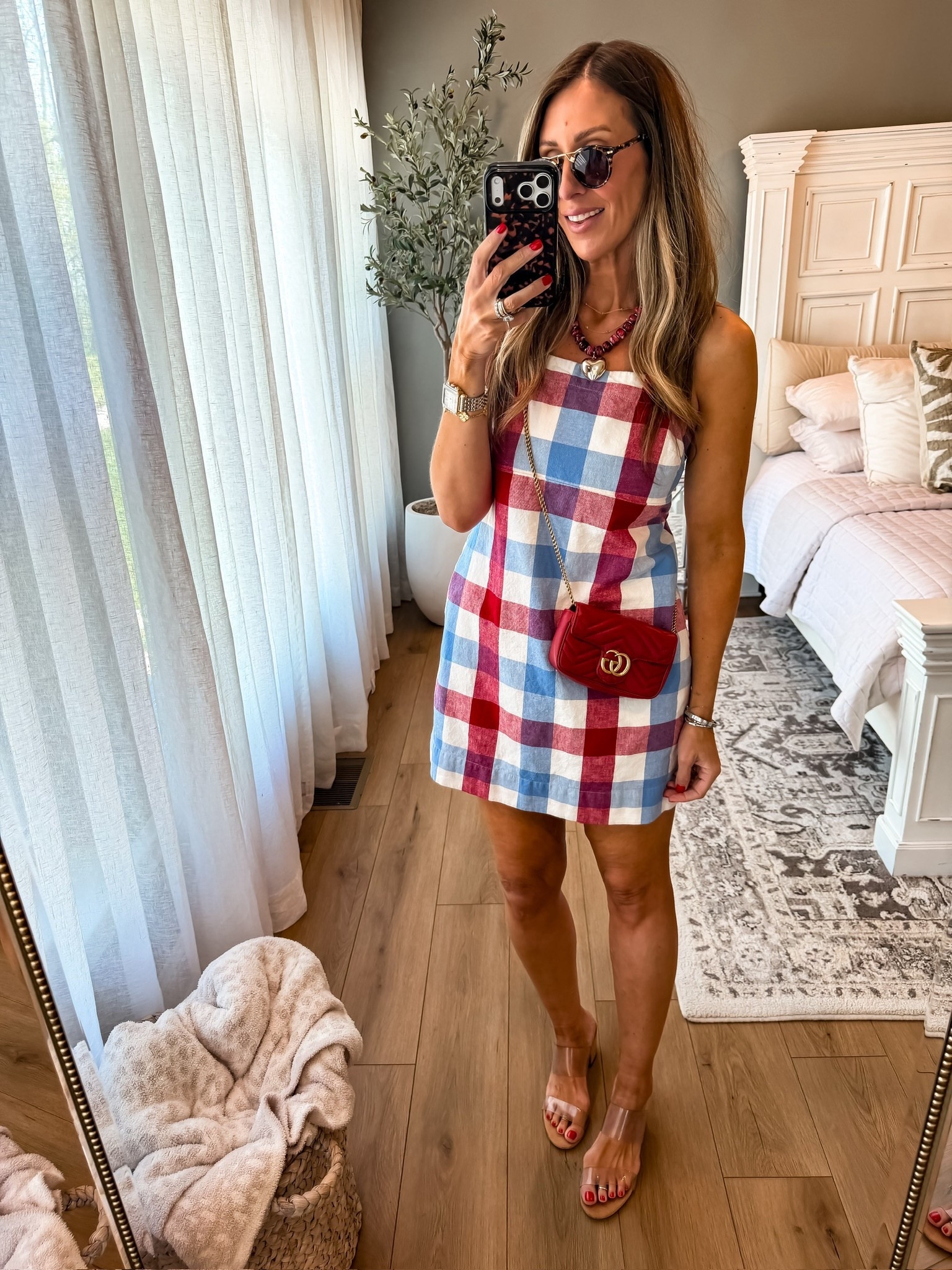 This dress just screams summer plans. The red, white, and blue gingham is so classic and flattering, and I love how easy it is to dress up or keep casual. Perfect for everything from BBQs to holiday weekends

gingham dress, red white blue outfit, summer dress, fourth of july outfit, patriotic style, casual summer look, themominstyle 

#LTKOver40 #LTKootd #LTKSeasonal