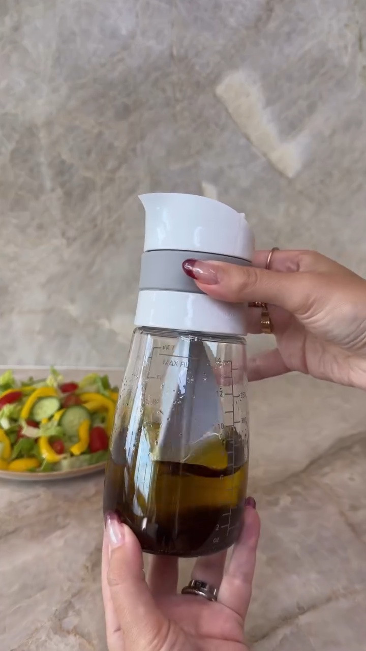 Amazon Salad Dressing Mixer! One of those kitchen gadgets I didn’t know I needed until I tried it. Perfect for homemade dressings, marinades and sauces without making a mess🙌💛

#mealprepmadeeasy #kitchengadget #homemadedressing

#LTKHome #LTKfoodie