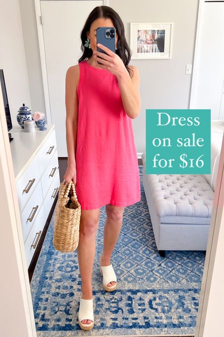 Adorable linen dress on sale for only $16!! A classic style, has pockets, and comes in 5 pretty colors. Perfect for spring break vacation or spring and summer get together or date nights! 

Paired with an affordable tote bag, statement earrings, and white woven heels.

Sizing:
Fits TTS. Im typically between XS and S and I’m wearing an XS and it fits great.

Target style, Target find, affordable fashion, spring dress, mom style 

#LTKsalealert #LTKfindsunder50 #LTKSeasonal