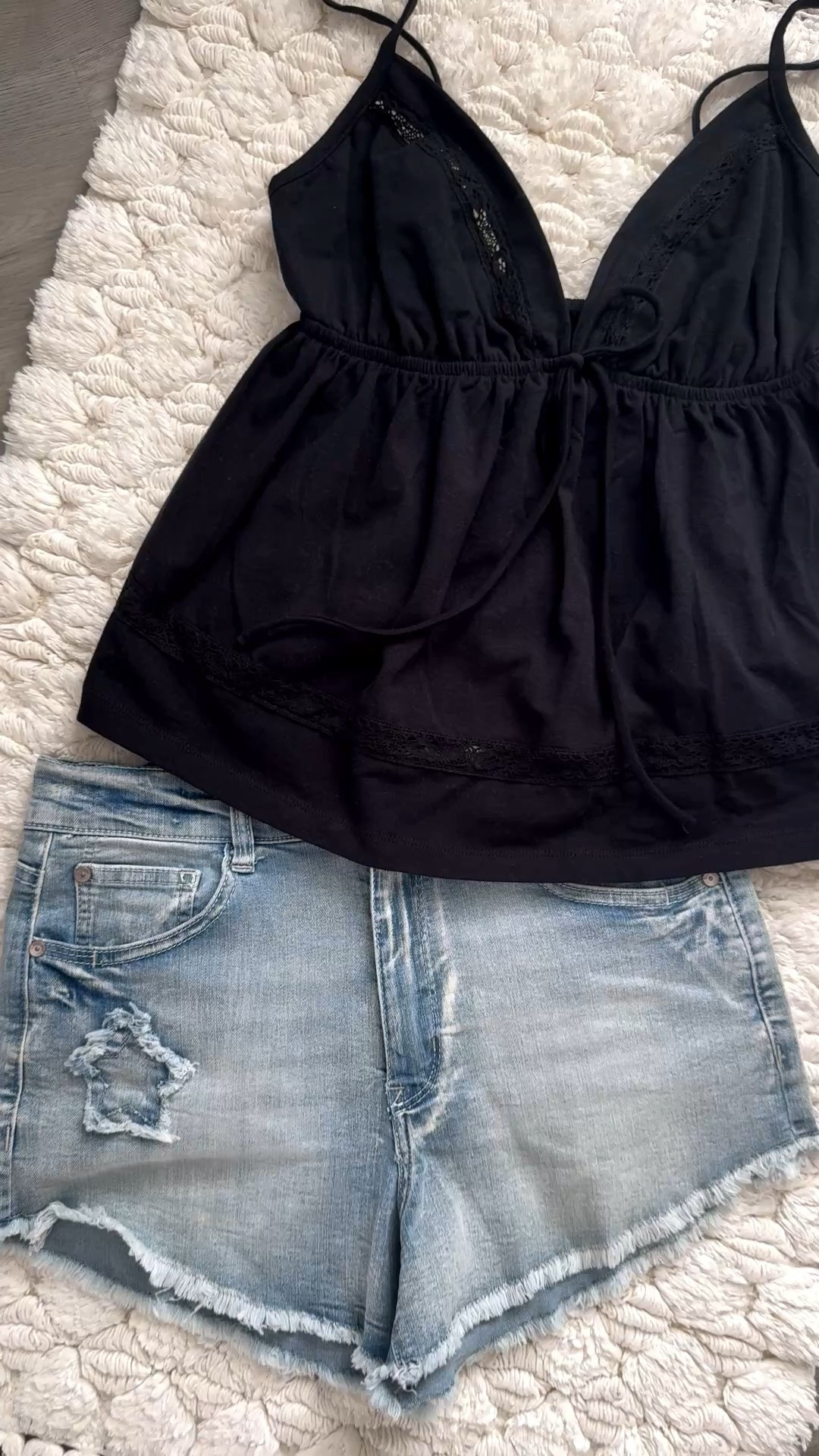 The ultimate throw-on-and-go summer top. This babydoll tank is giving comfy + cute in the best way possible! The flowy fit, delicate lace details, and lightweight feel make it perfect for hot summer days, beach trips, concerts, brunch, or just running errands looking effortlessly put together. I grabbed the black in a size M for a little extra room in the chest area and the fit is SO good! Bonus: it comes in 4 adorable color options so you may end up needing more than one. Paired with denim shorts and sandals for the easiest everyday summer outfit!

#LTKStyle #LTKSummer #SummerStyle #BabydollTop #SummerOutfit #CasualChic #EffortlessStyle #NeutralStyle #EverydayFashion #FashionFinds #LTKUnder50 #CuteSummerOutfit #BeachyStyle #OOTDStyle #VacationStyle #ComfyCute #TrendyStyle #DenimShortsStyle #AmazonFashionFinds #SummerWardrobe

babydoll tank top • summer tank top • flowy cami • lace trim tank • cute summer tops • lightweight summer outfit • casual summer fashion • black babydoll top • flattering tank top • tanks for larger chest • trendy summer outfit • comfy cute outfit • vacation outfit ideas • beach vacation clothes • casual chic style • everyday summer look • feminine summer tops • airy summer clothing • easy summer outfit • denim shorts outfit

#LTKootd #LTKOver40 #LTKgrwm