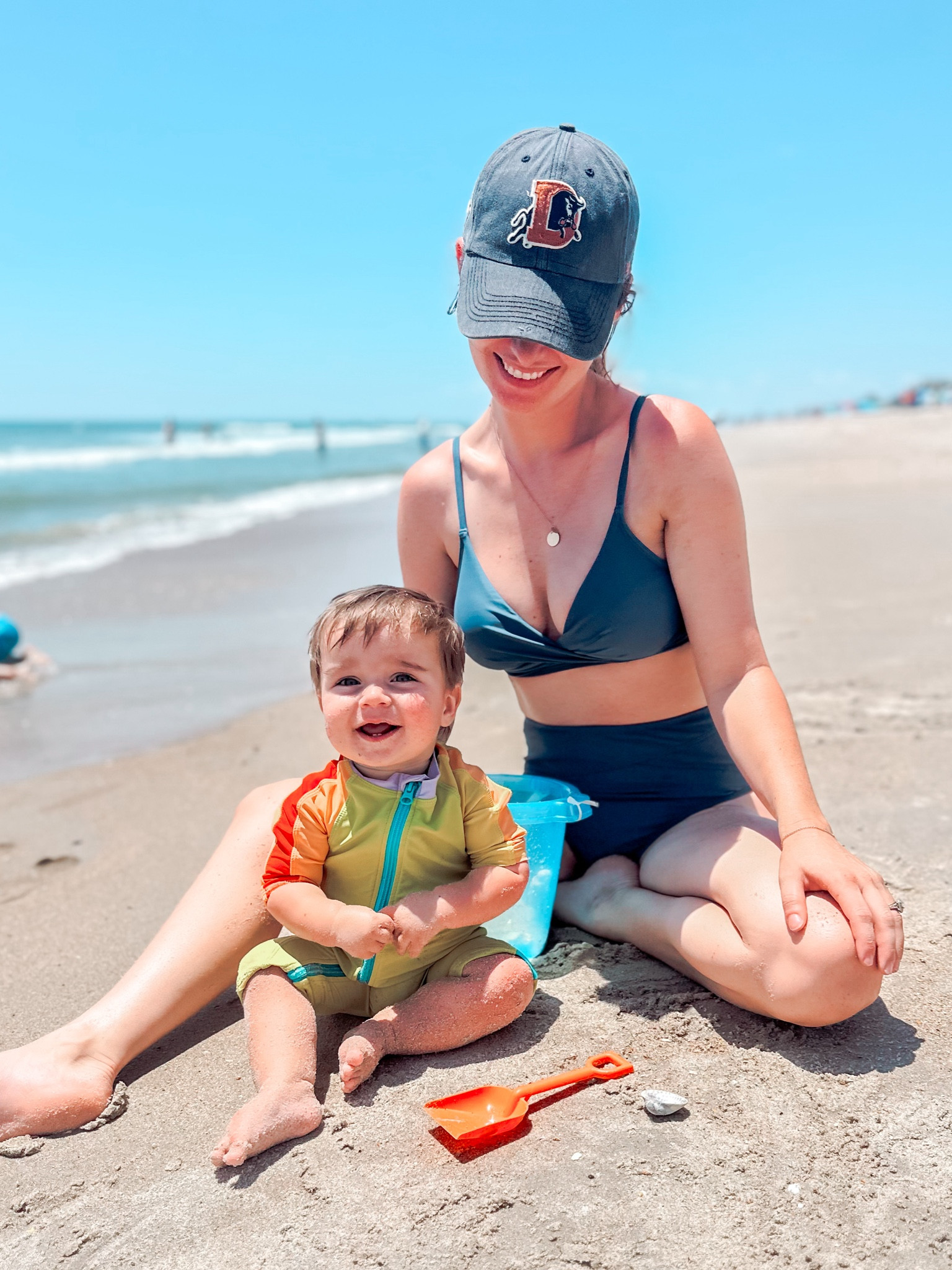 Just a couple of beach bums 🥹🫶🏻 Linking both of our suits! 👙🩱

#LTKBaby #LTKSwim