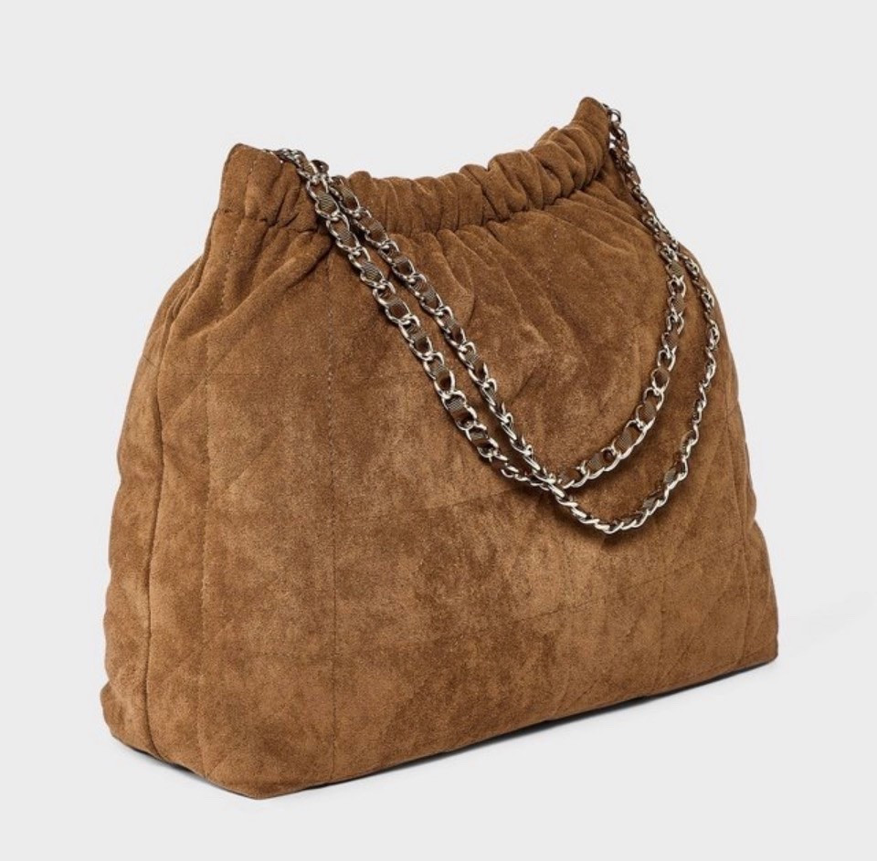 High-end look without the designer price tag! 🤎 This faux suede quilted tote from Target is a must-have accessory. Shop the exact link right here!

#LTKSeasonal #LTKOver40